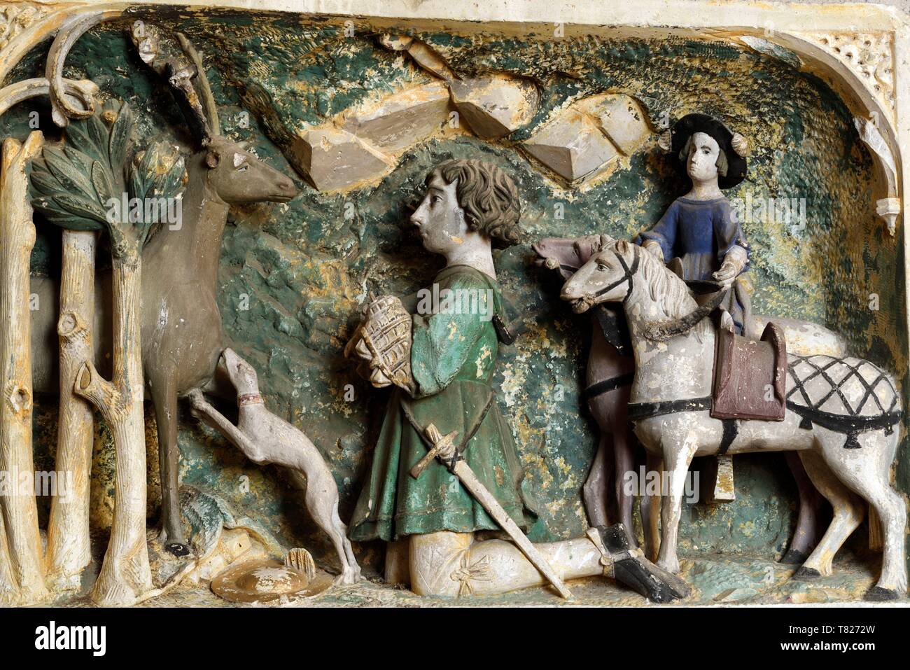 France, Jura, Saint Lothain, église du 10e siècle, Saint Hubert's hunt, bas-relief en albâtre polychrome de 1516 Banque D'Images