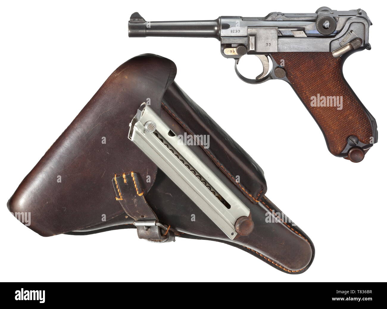 Un pistolet 08 DWM 1918, avec étui Cal. 9 mm parabellum, no 1233e. Les numéros correspondants y compris percuteur poignée et panneaux. Alésage comme un miroir. Différentes marques d'acceptation impériale. Original, complet avec un minimum de bleuissement brossé trace de l'utilisation sur la plaque de déclenchement. Les petites et les pièces de fonctionnement complètement jaune et bleu. Poignée en hêtre panneaux. Impeccable, feuilles de métal nickelé magazine, le numéro correspondant à 1233e. Un modèle de collection dans presque intacte la menthe état général. Vient avec un étui brun foncé fait de peau de vache en presque aussi mint cond, Additional-Rights Clearance-Info-Not-Available- Banque D'Images