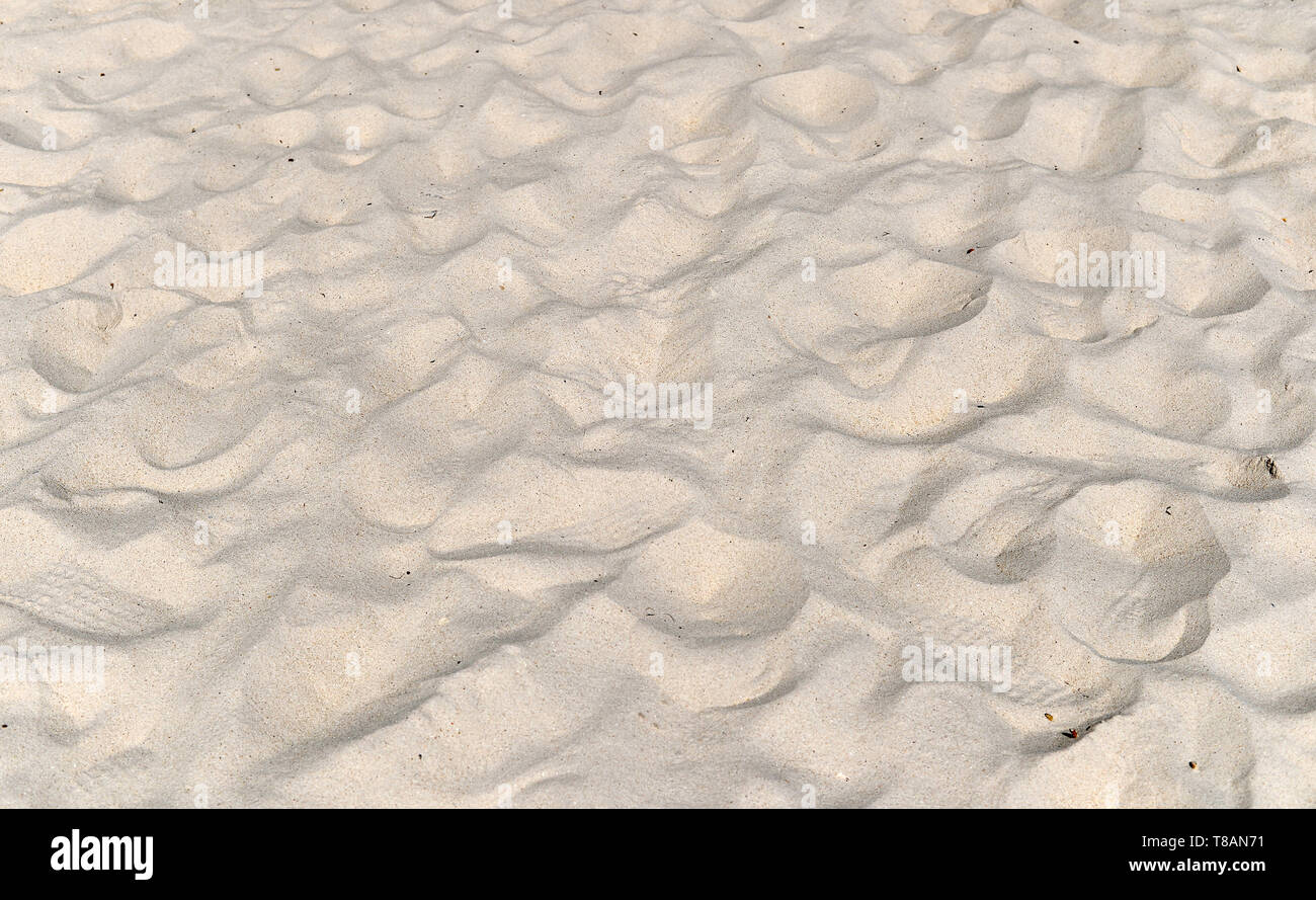 La texture du sable de plage. La mer de sable pour l'arrière plan. Banque D'Images