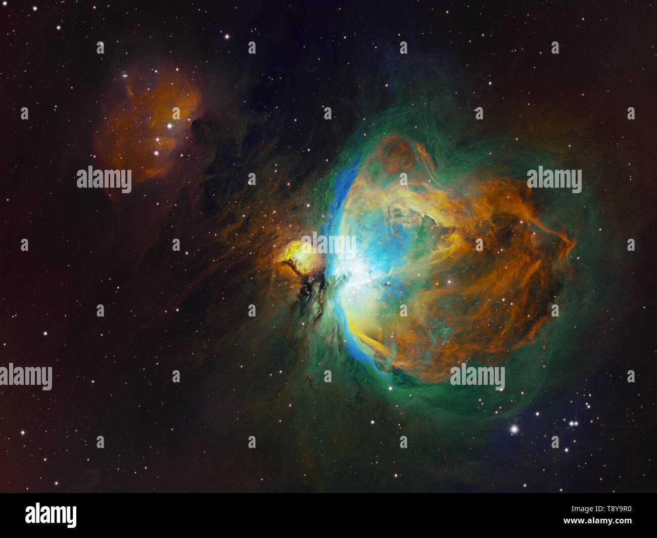Les objets de l'espace lointain et Orion Nebula Homme courant dans la constellation d'Orion, photo dans la palette de couleurs de Hubble. Cette photo est étroite Banque D'Images