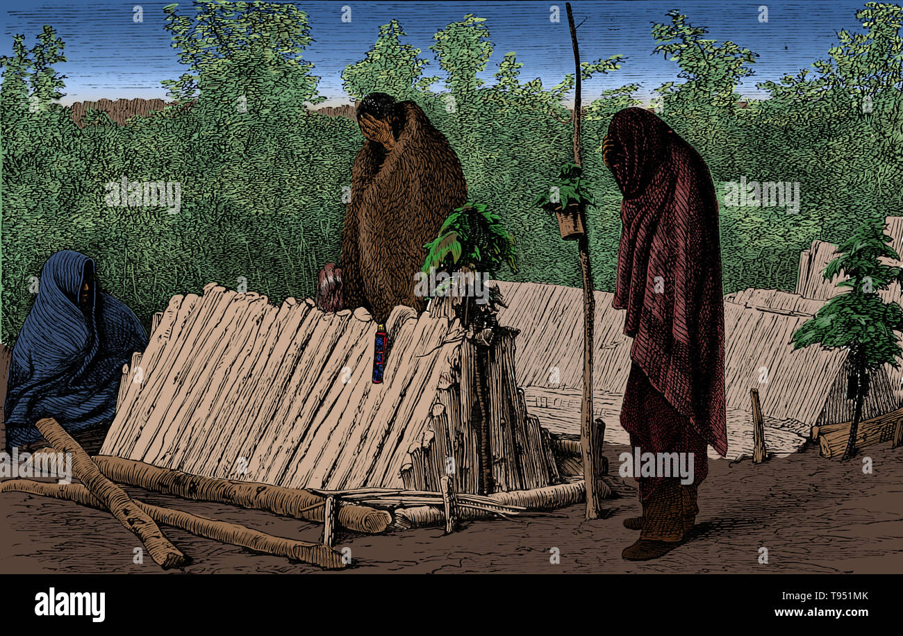 Chippewa ou Ojibwe graves et de deuil, dans une fête pour les morts, 1873. "En face de la tombe est plus proche vu les graves post, avec des feuilles et un bateau pour les offrandes qui y sont liés. À la fin de la structure en bois qui couvre la tombe est un trou pour l'insertion des offrandes de nourriture, et en haut c'est ornée de feuilles. Sur le côté est le couteau-hung a travaillé de la défunte, et au-dessus est une coiffe de plumes." John William Dawson. Banque D'Images Chippewa ou Ojibwe graves et de deuil, dans une fête pour les morts, 1873. "En face de la tombe est plus proche vu les graves post, avec des feuilles et un bateau pour les offrandes qui y sont liés. À la fin de la structure en bois qui couvre la tombe est un trou pour l'insertion des offrandes de nourriture, et en haut c'est ornée de feuilles. Sur le côté est le couteau-hung a travaillé de la défunte, et au-dessus est une coiffe de plumes." John William Dawson. Banque D'Images
