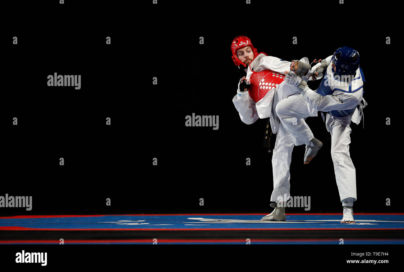 La société britannique Damon du défilé Sansum action oin pendant son cycle de 16 match contre l'Italie Roberto Botta, pendant quatre jours de la World Taekwondo Championships à la Manchester Arena, Manchester. Banque D'Images