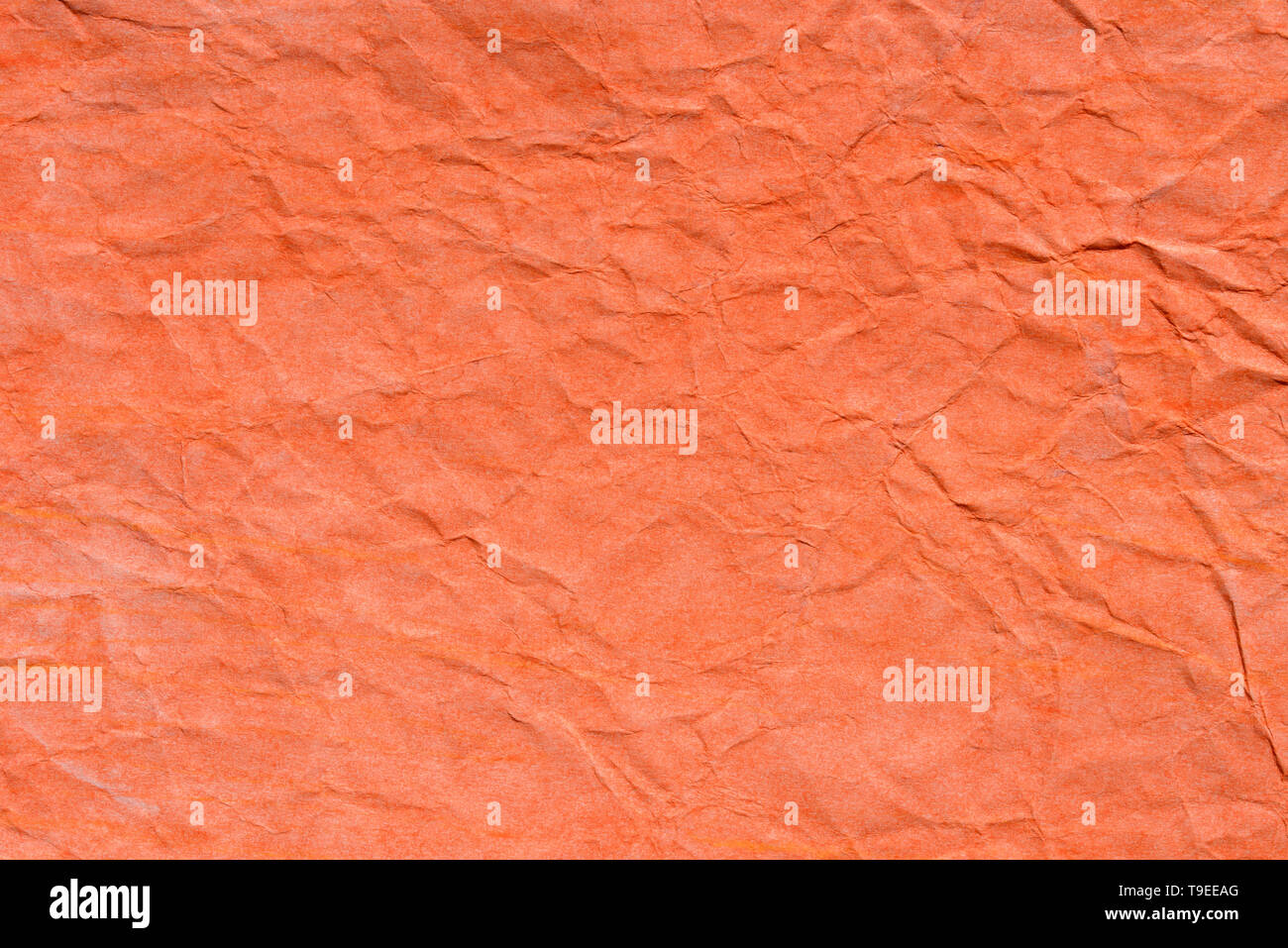 Couleur orange pastel texture de fond papier froissé Banque D'Images