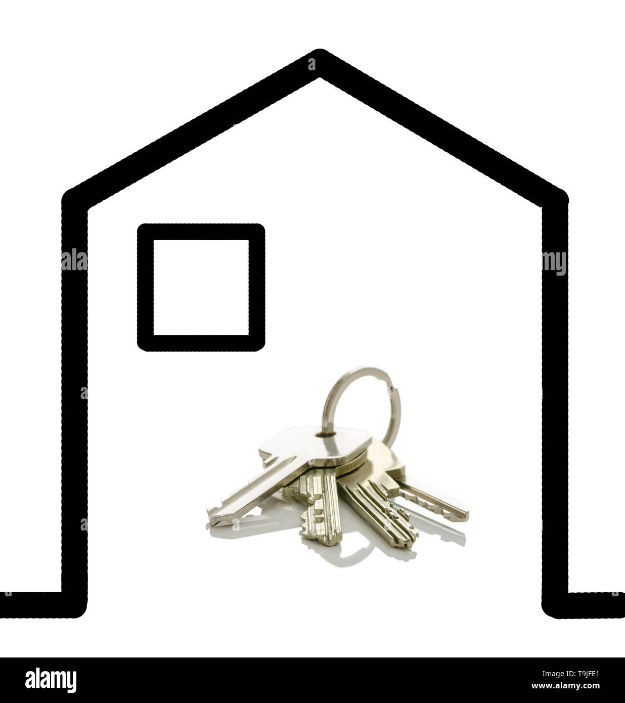 Clés de la maison située dans une chambre sur un tableau blanc. Banque D'Images