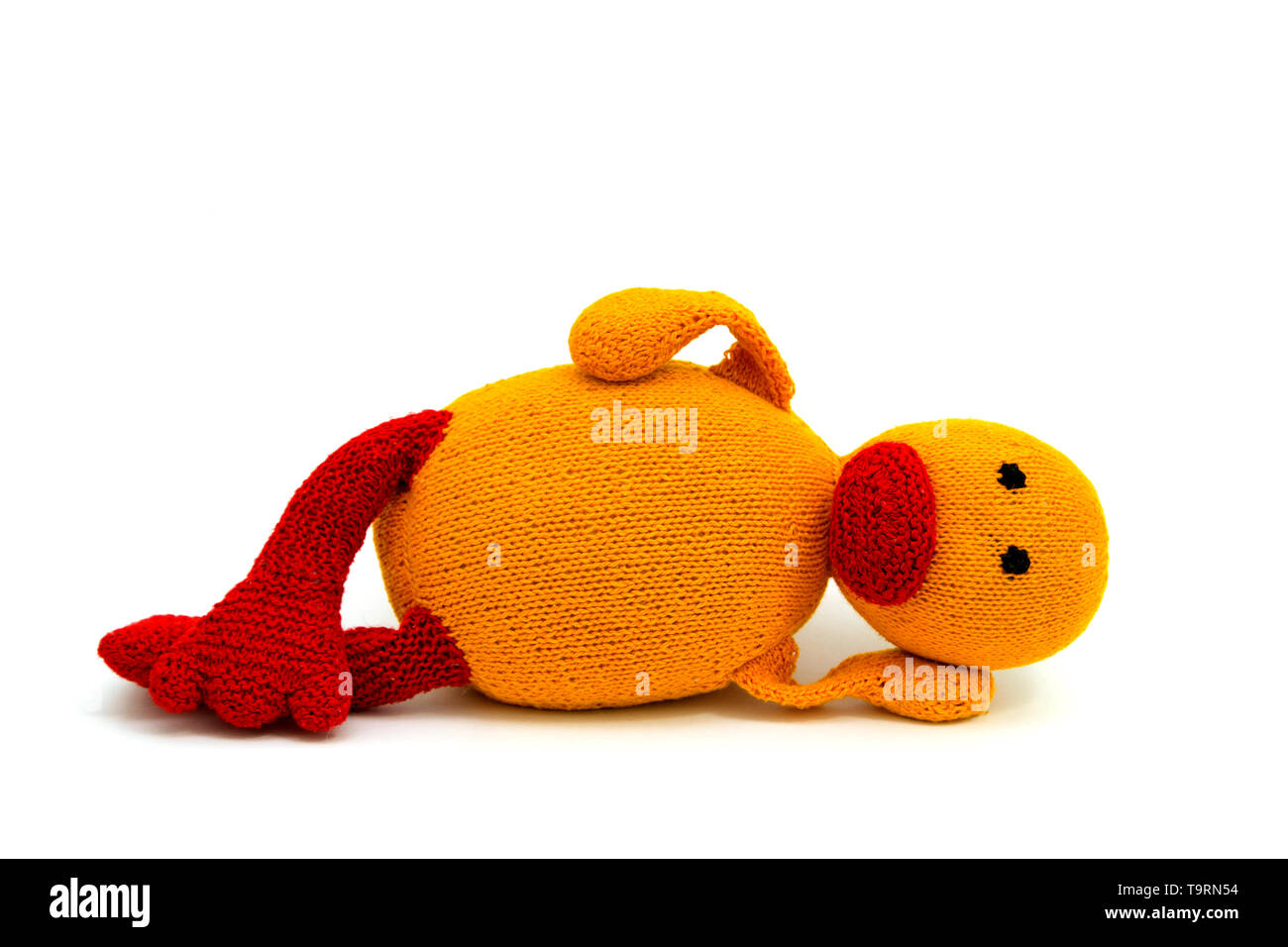 Peluche jouet canard tricotés dans funny pose Banque D'Images