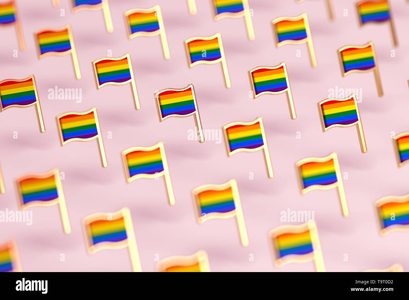 Blurry close-up se concentrer sur Rainbow flags LGBTQ. Le mois de juin gay pride symbole concept. Isolé sur fond rose pastel. Le rendu 3D Banque D'Images