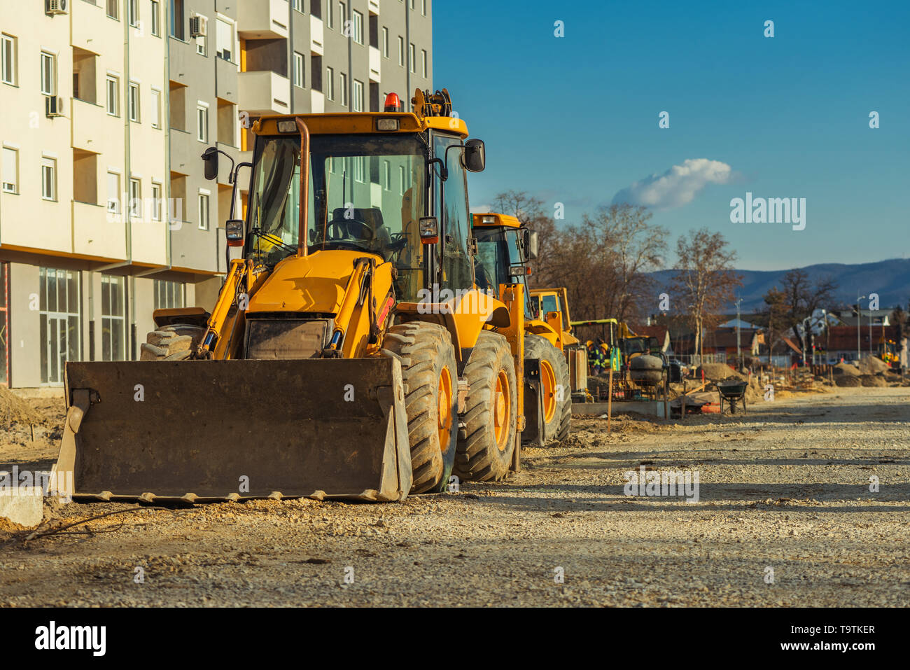 Véhicule de construction avec le chargeur sur chantier, de l'industrie de la machinerie lourde Banque D'Images