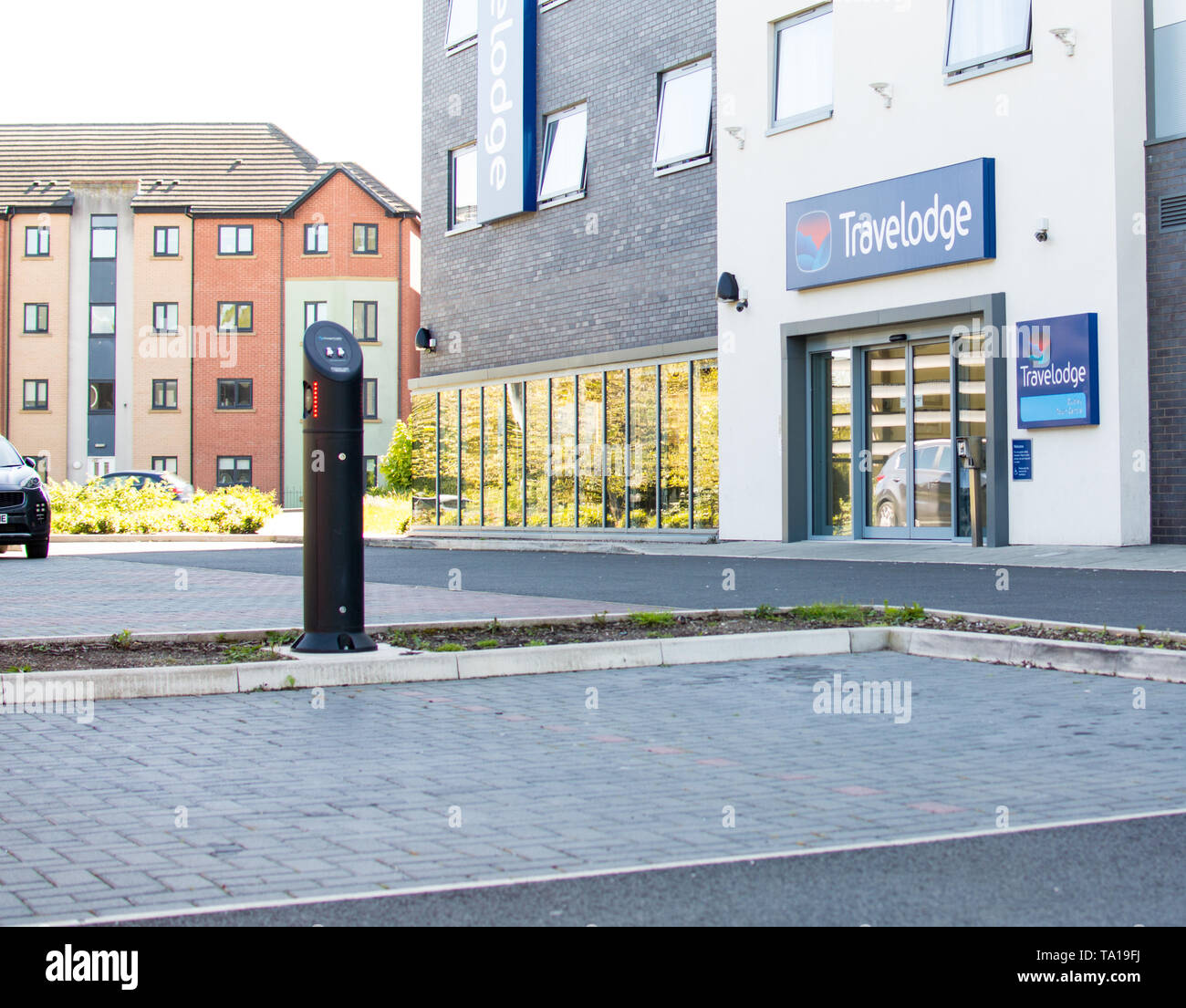 Point de recharge de véhicules électriques dans le parking de l'hôtel Banque D'Images