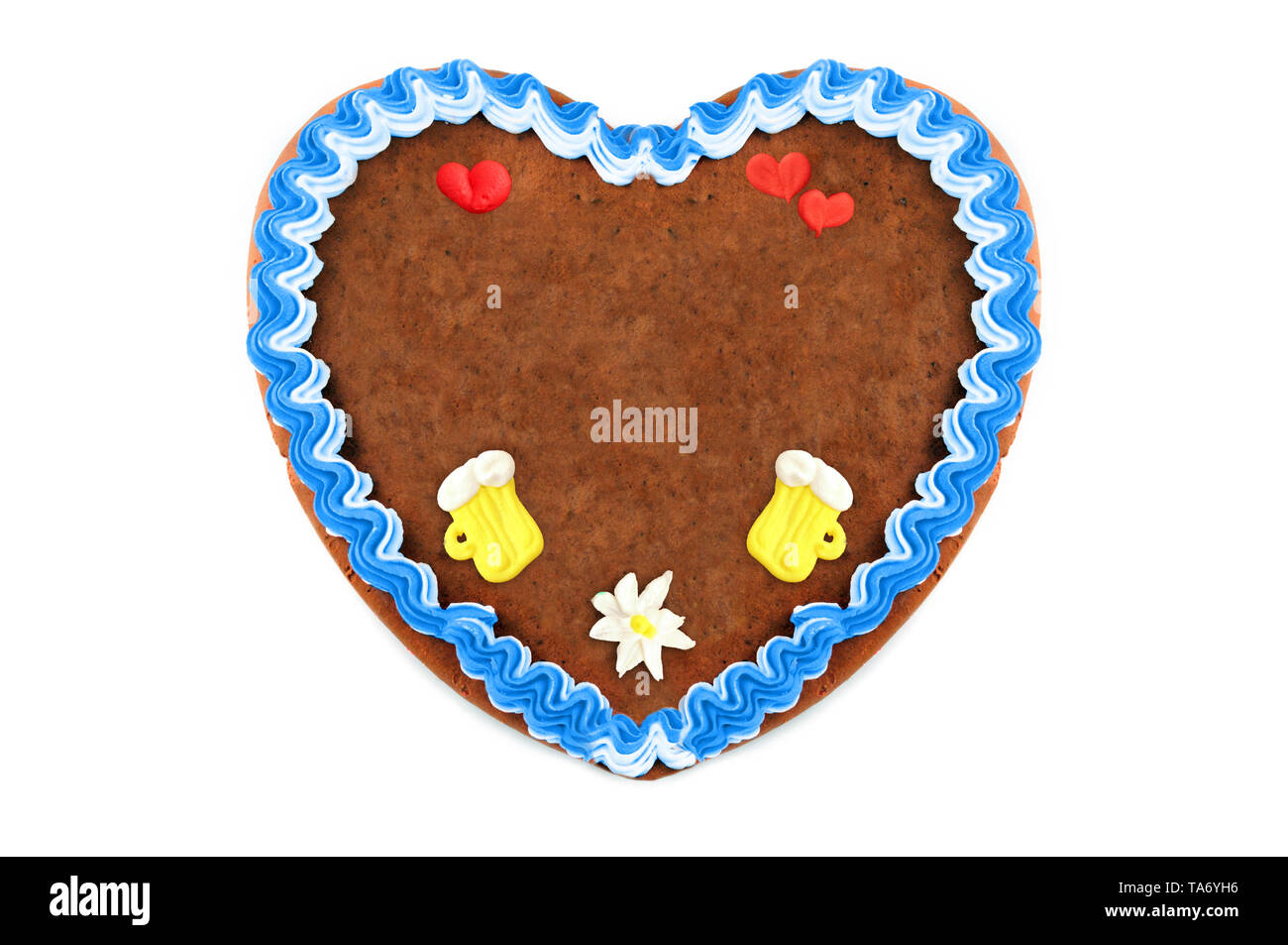 Gingerbread cookie coeur Oktoberfest avec ornements et copiez l'espace. Oktoberfest est un octobre fest de Munich Allemagne pour la bière et bavaroise. Banque D'Images