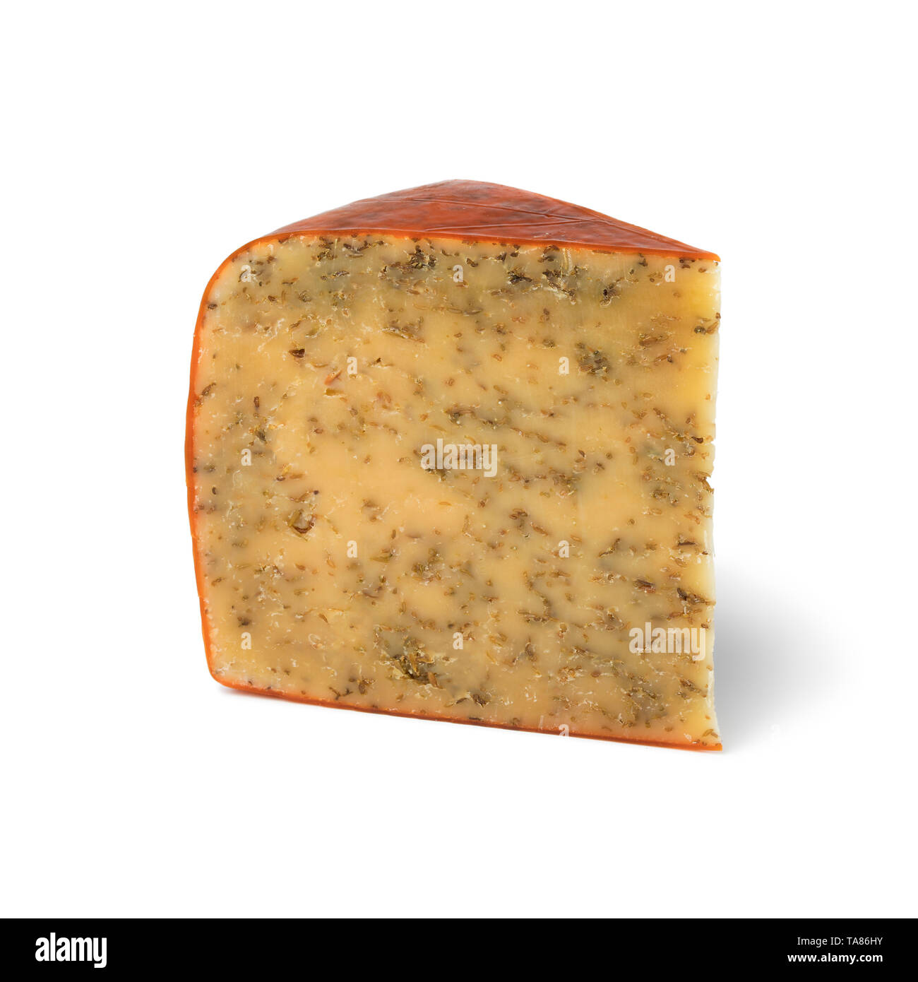 Vieux morceau de fromage au cumin matures à partir de la partie nord de la Hollande isolé sur fond blanc Banque D'Images