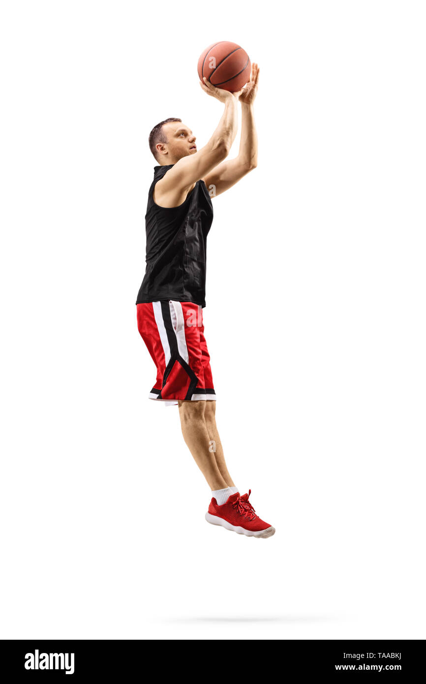 Longueur totale d'un joueur de basket-ball masculin de saut et le tournage  d'un ballon isolé sur fond blanc Photo Stock - Alamy
