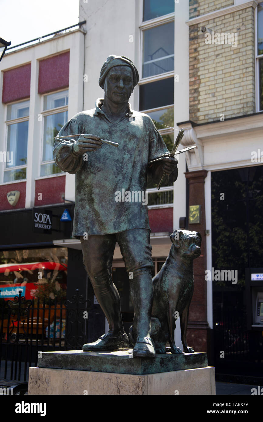 La statue du peintre William Hogarth et son chien pug Trump par le sculpteur Jim Mathieson , Chiswick High Road, London, W4 UK Banque D'Images