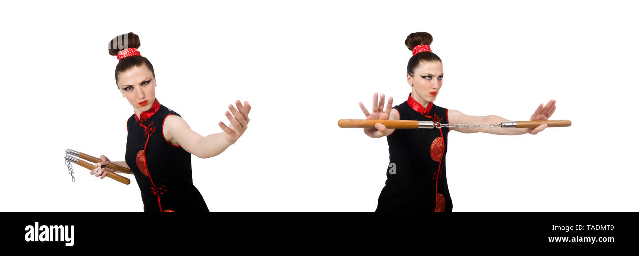 Femme drôle avec nunchucks isolated on white Banque D'Images