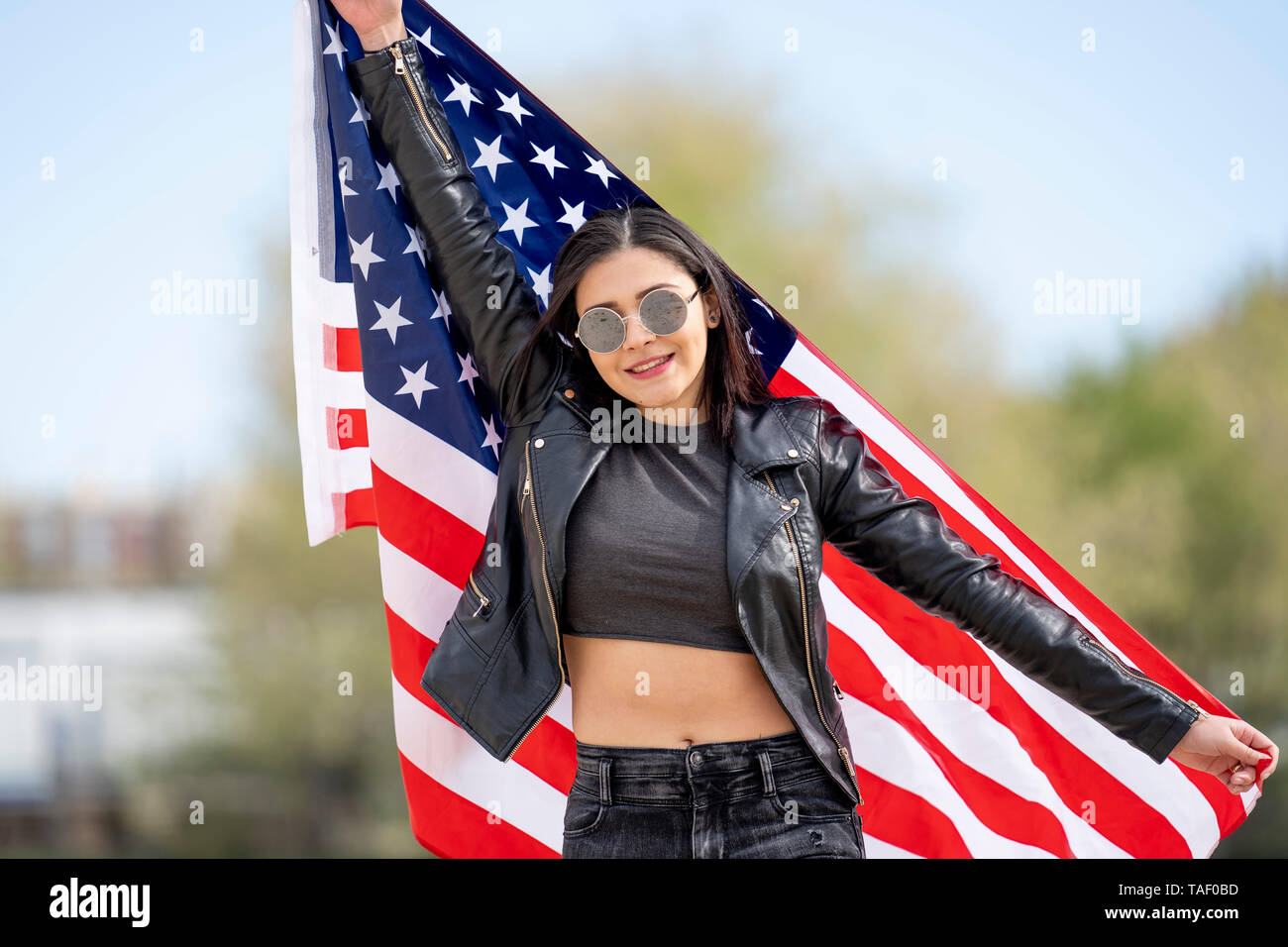 Jeune femme avec le drapeau américain Banque D'Images