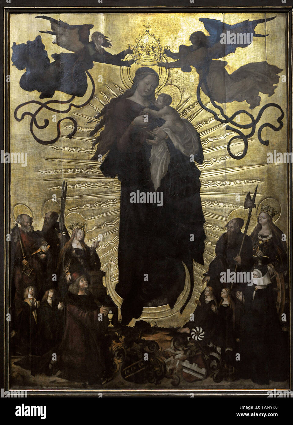 Vierge à l'enfant. Lindner et son épouse sont décrits comme des donateurs, accompagnée d'enfants et d'un saint patron de vénérer la Vierge. Épitaphe de Nikolaus Lindner (d.1511), ca.1511. Panneau de bois. De l'église de Sainte Barbara, Wroclaw (Breslau). Musée national. Varsovie. La Pologne. Banque D'Images