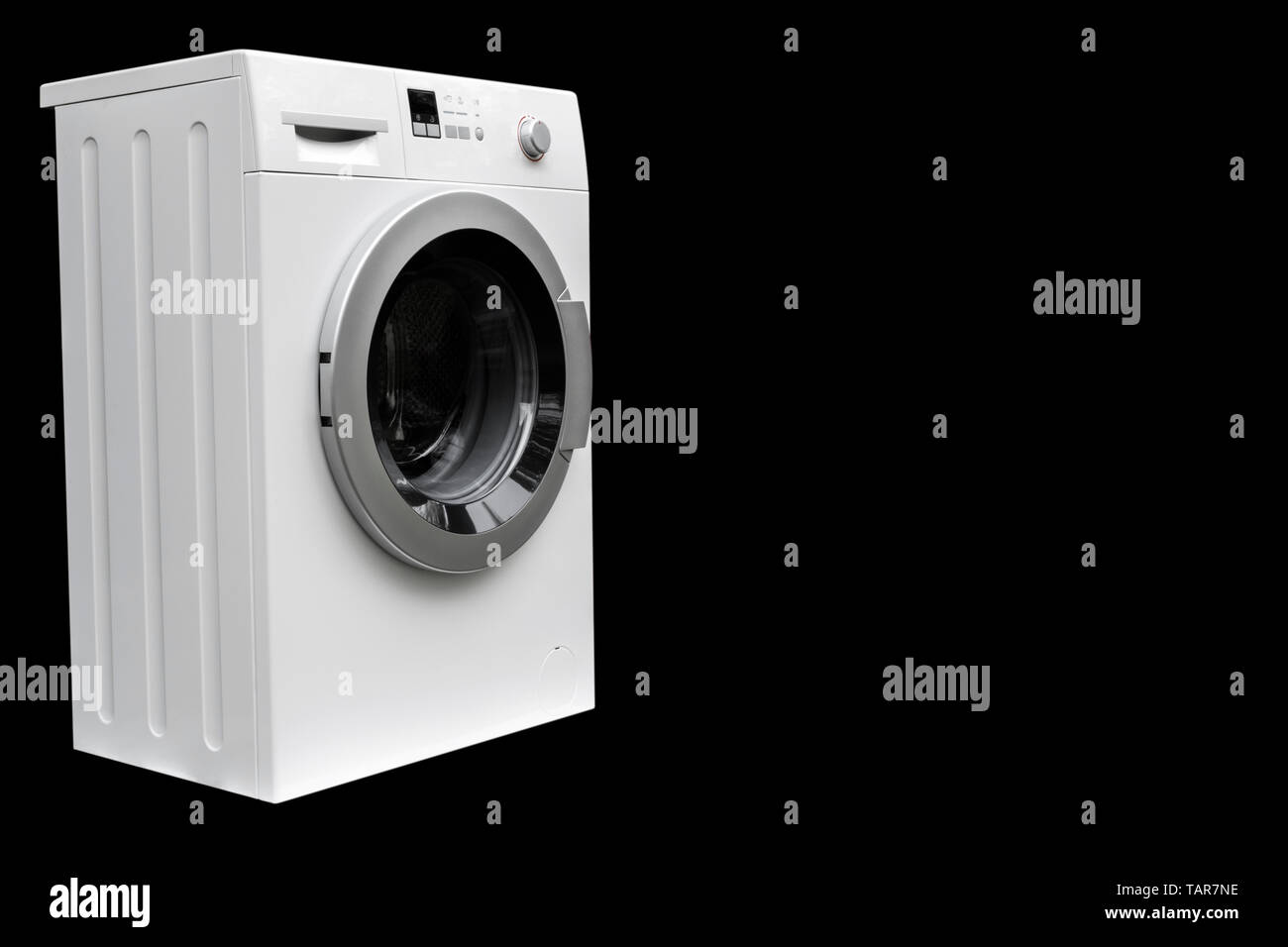 Lave-linge isolé sur fond noir. Lave-linge isolated over noir. Banque D'Images
