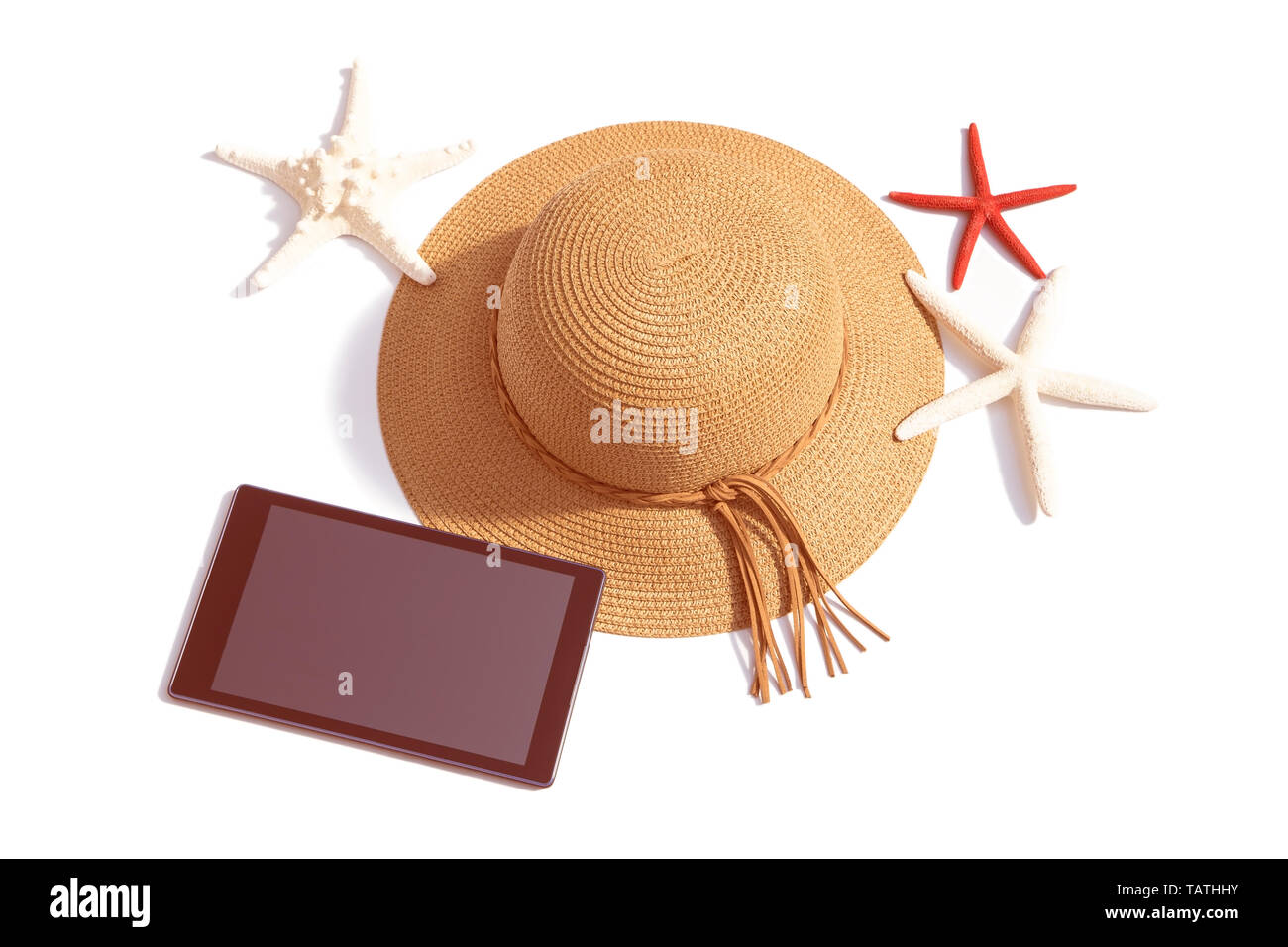 Woman's accessoires de plage avec une tablette noir Banque D'Images