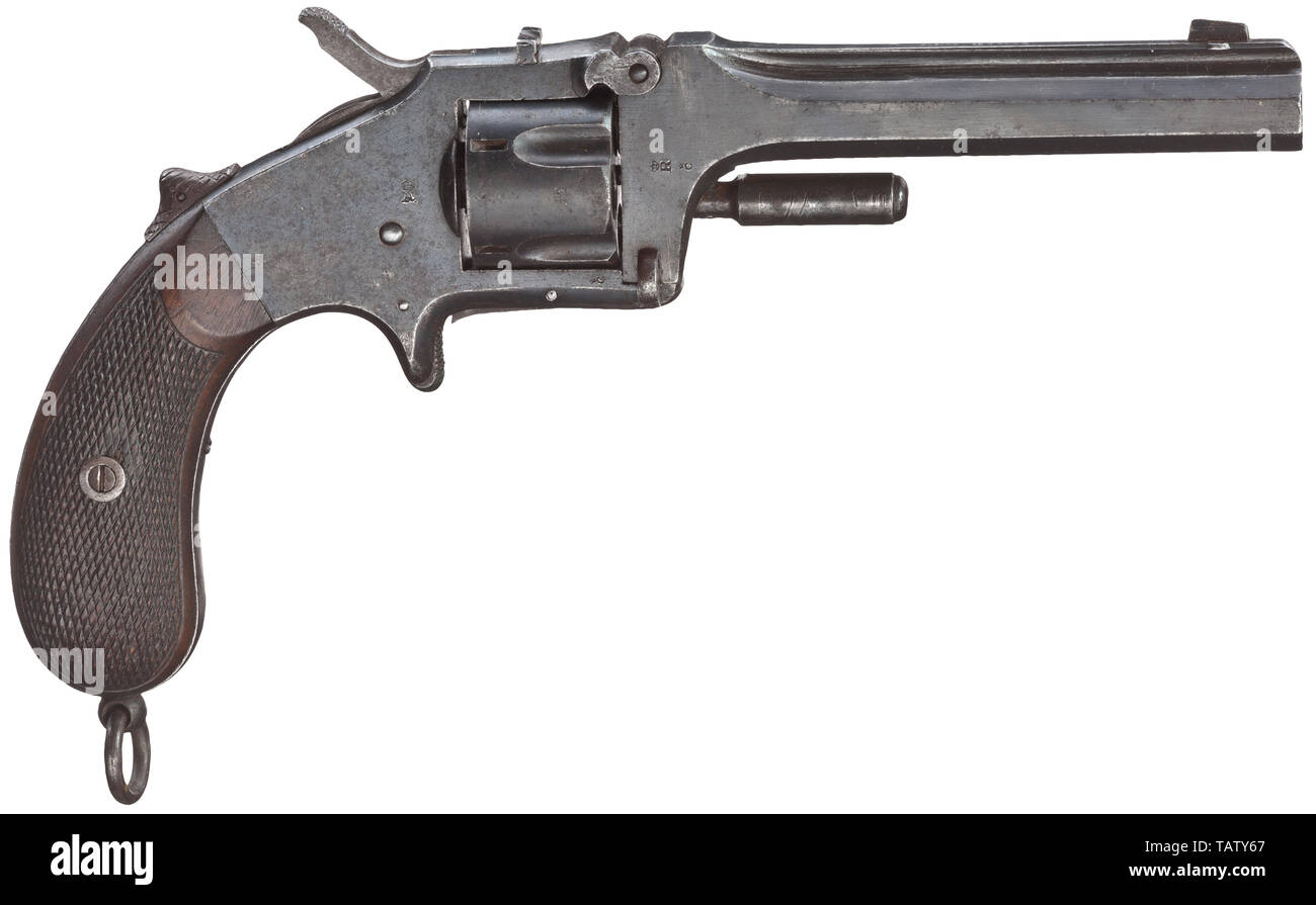 Un revolver Saxon Mod. 1873, Cal. Fc 11 mm, no. 1116. Canon octogonal, légèrement rugueux alésage dans le centre, avec de bonnes rayures, longueur 140 mm. Cinq coups de feu. Cylindre cannelé avec ELG-marque d'épreuve. Faites par F. Langenhan, Cella près de Suhl. Timbre de qualité crown/A. Cachet de l'unité '28.A.1.66' pour le 2e Régiment d'artillerie n° 28, 1re batterie, 66 armes, Garrison Pirna. Aucune année d'émission ou de l'année de modification. Sur canon rib dealer's address 'J.PIRE & CO ANVERS". En partie de bleuissement bleu-noir repéré et patiné. Poignée en noyer avec quadrillage. Boucle de sangle. Additional-Rights Clearance-Info Erwer,--Not-Available Banque D'Images