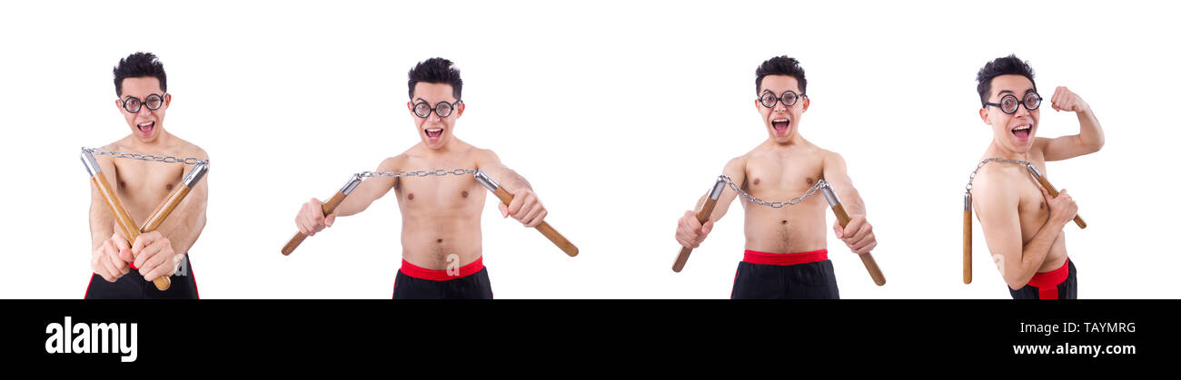Mec drôle avec nunchucks on white Banque D'Images