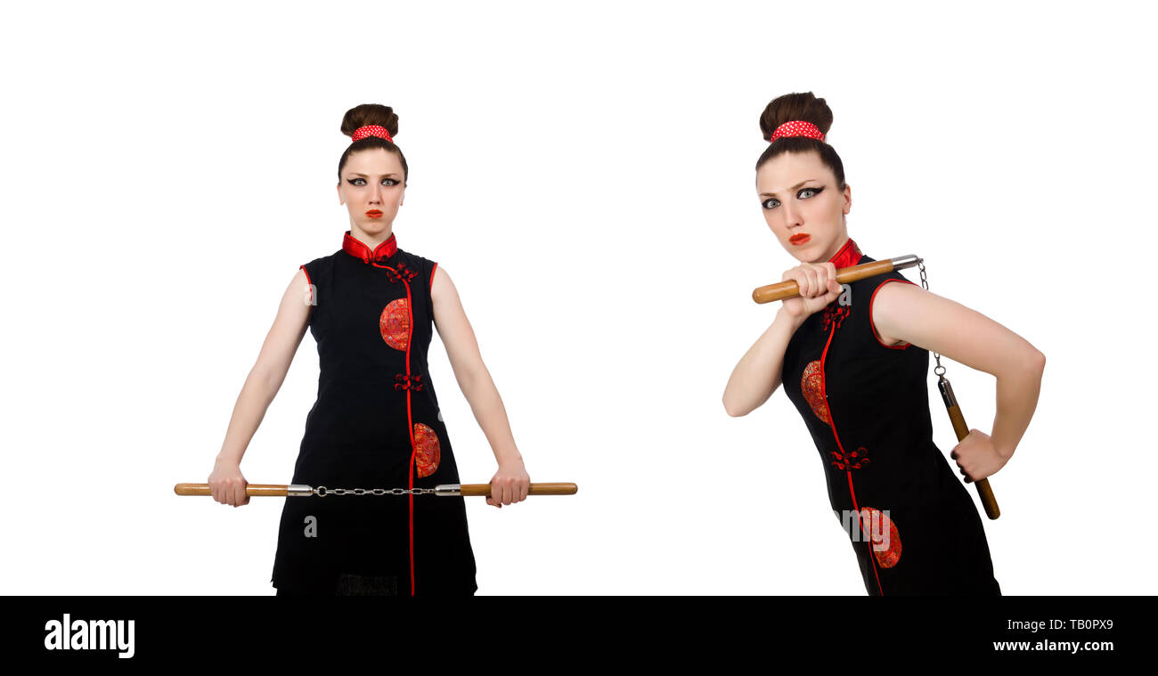 Femme drôle avec nunchucks isolated on white Banque D'Images