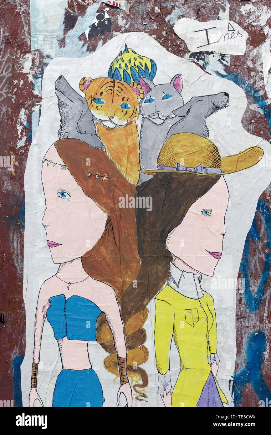 Coller en place, deux amis avec des animaux, d'un sèche liée à une politique commune de fuseaux, art de rue, district Carme, vieille ville, Valencia, Espagne Banque D'Images