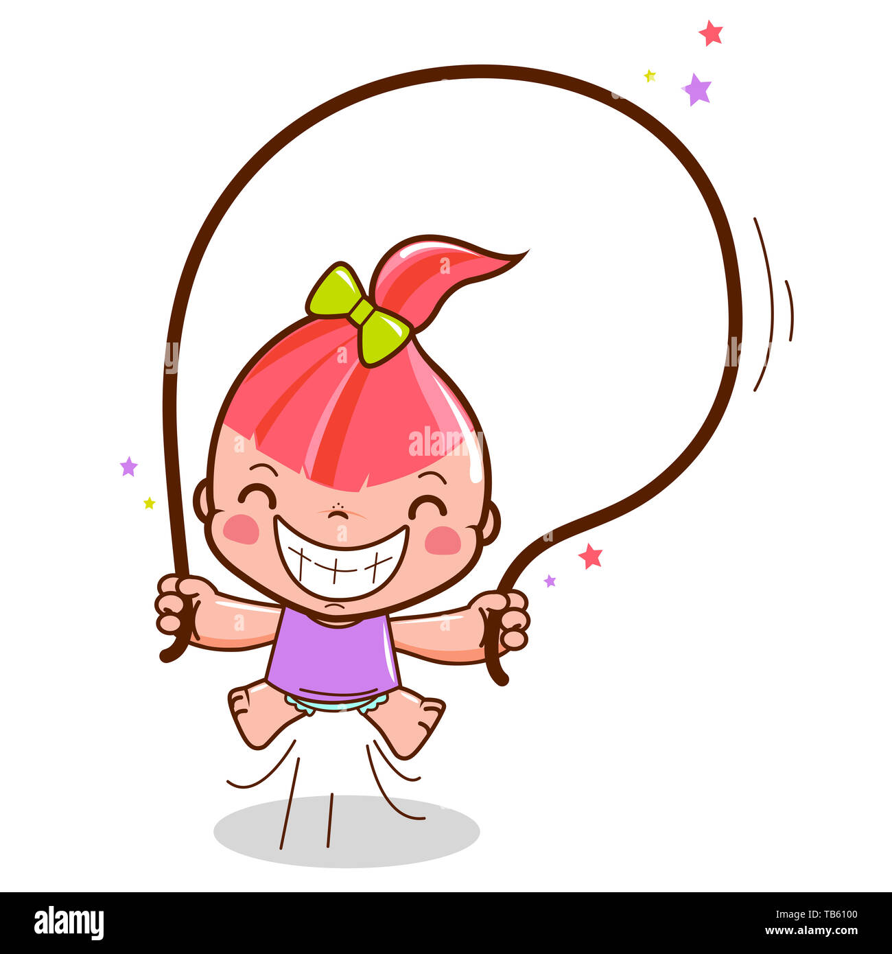 Enfant qui fait de l'exercice et qui s'amuse à sauter avec une corde. Activité fitness pour les enfants. Une petite fille heureuse sautant et jouant. Banque D'Images