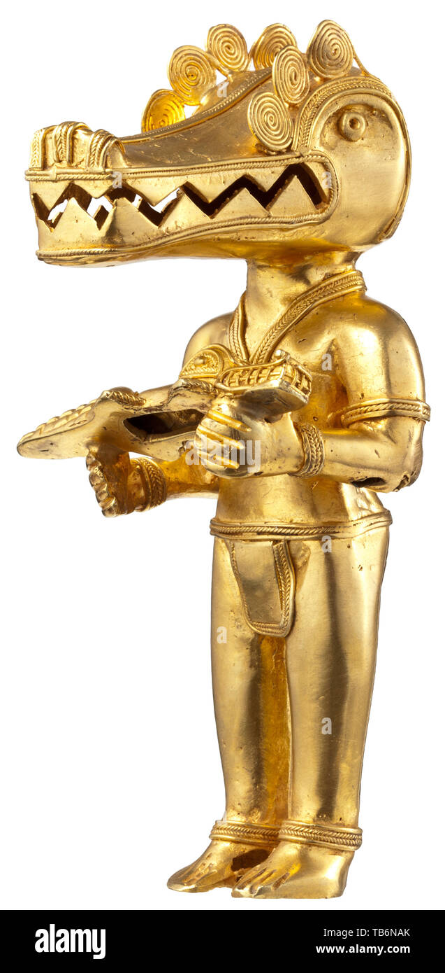 Une figure de l'or colombien le tumbaga, minutieusement travaillé, en creux la figure d'or/cuivre alliage. Représentation d'une divinité avec une tête de crocodile, tenant dans ses mains un petit crocodile. Hauteur 15 cm, poids 205 g. Le Tumbaga alliage avec ses composantes centrales de l'or et du cuivre a été répandue dans l'antiquité La Colombie et des pays de l'Amérique centrale. Les teneurs en cuivre peut dépasser plus de 70  %. Pendant le processus de fabrication le cuivre à la surface a été dissous par les acides végétaux, la création d'une surface d'or pur. historique, pré-historique, Additional-Rights Clearance-Info-colombien-Not-Available Banque D'Images