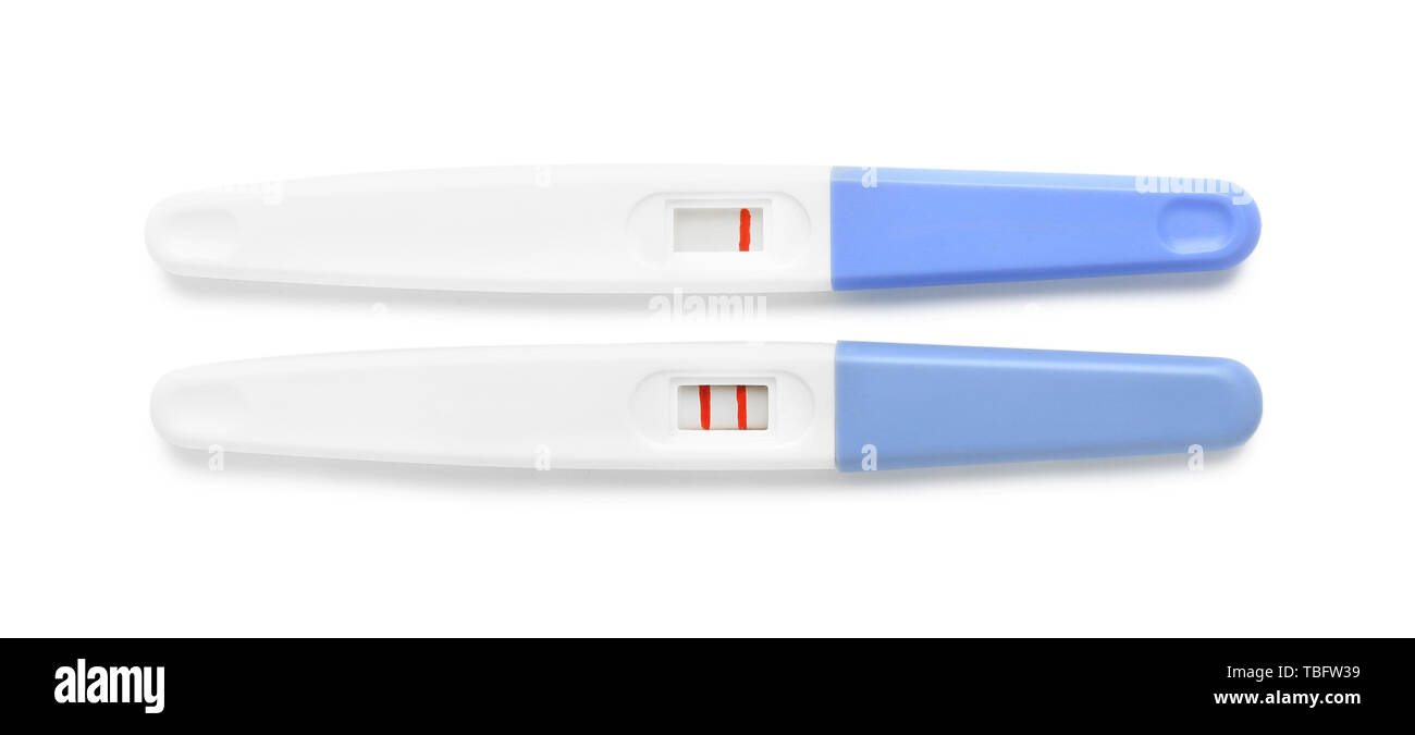 Test de grossesse positif et négatif sur fond blanc Photo Stock - Alamy
