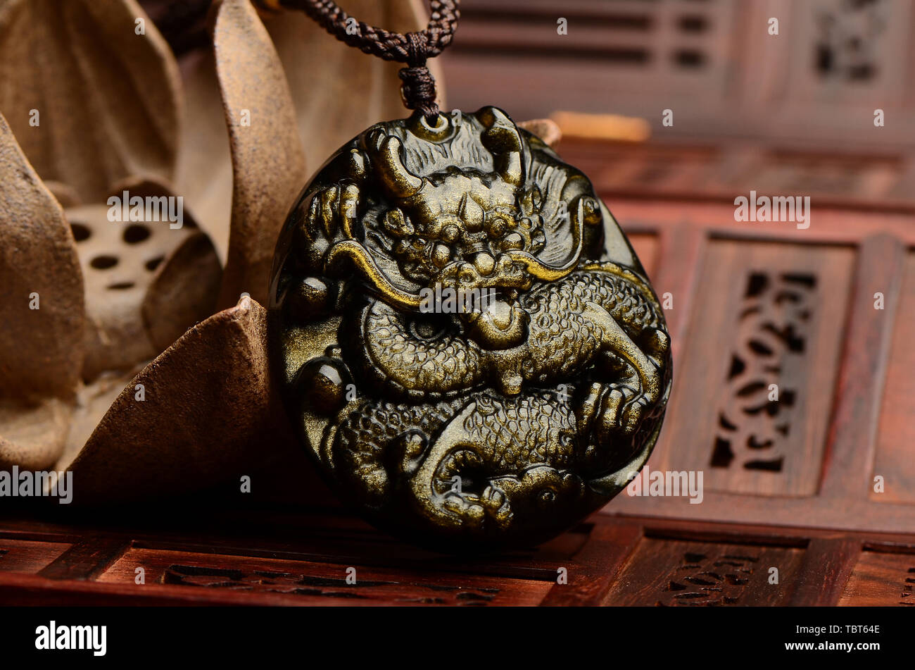 Pendentif dragon d'obsidienne Banque D'Images