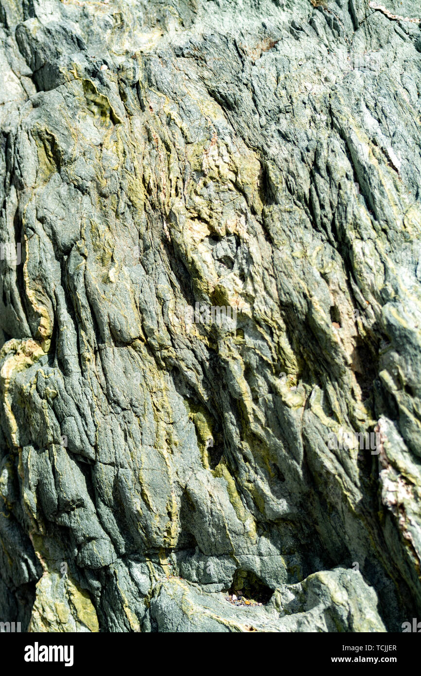 Avec l'arrière-plan minéral vert rock close up, texture de pierre précieuse, l'olivine, l'amazonite, l'amphibolite, géologie historique Banque D'Images