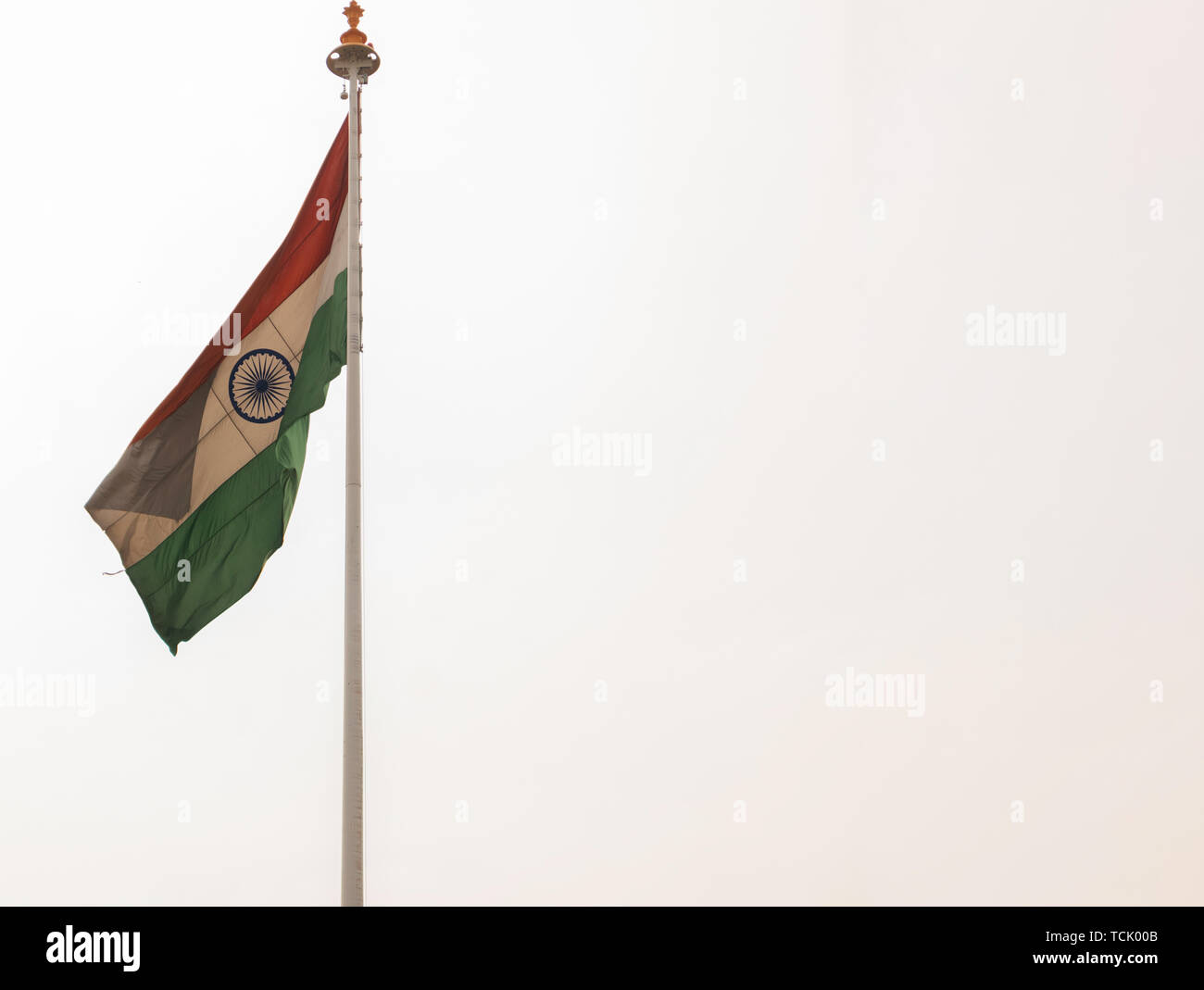 Véritable de brandir le drapeau de l'Inde à la gare. Banque D'Images