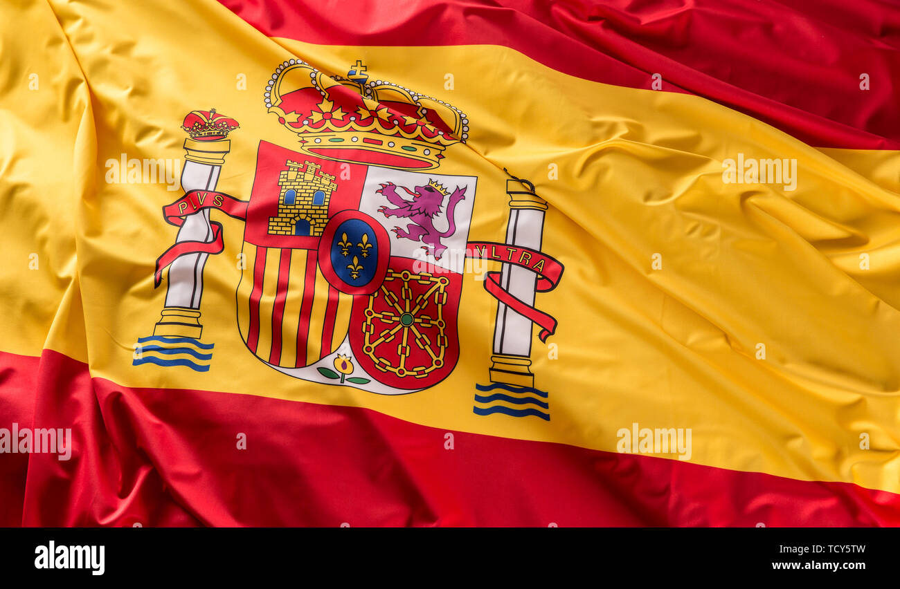 Espagne drapeau de soie. Les couleurs de l'emblème national espagnol avec. Banque D'Images