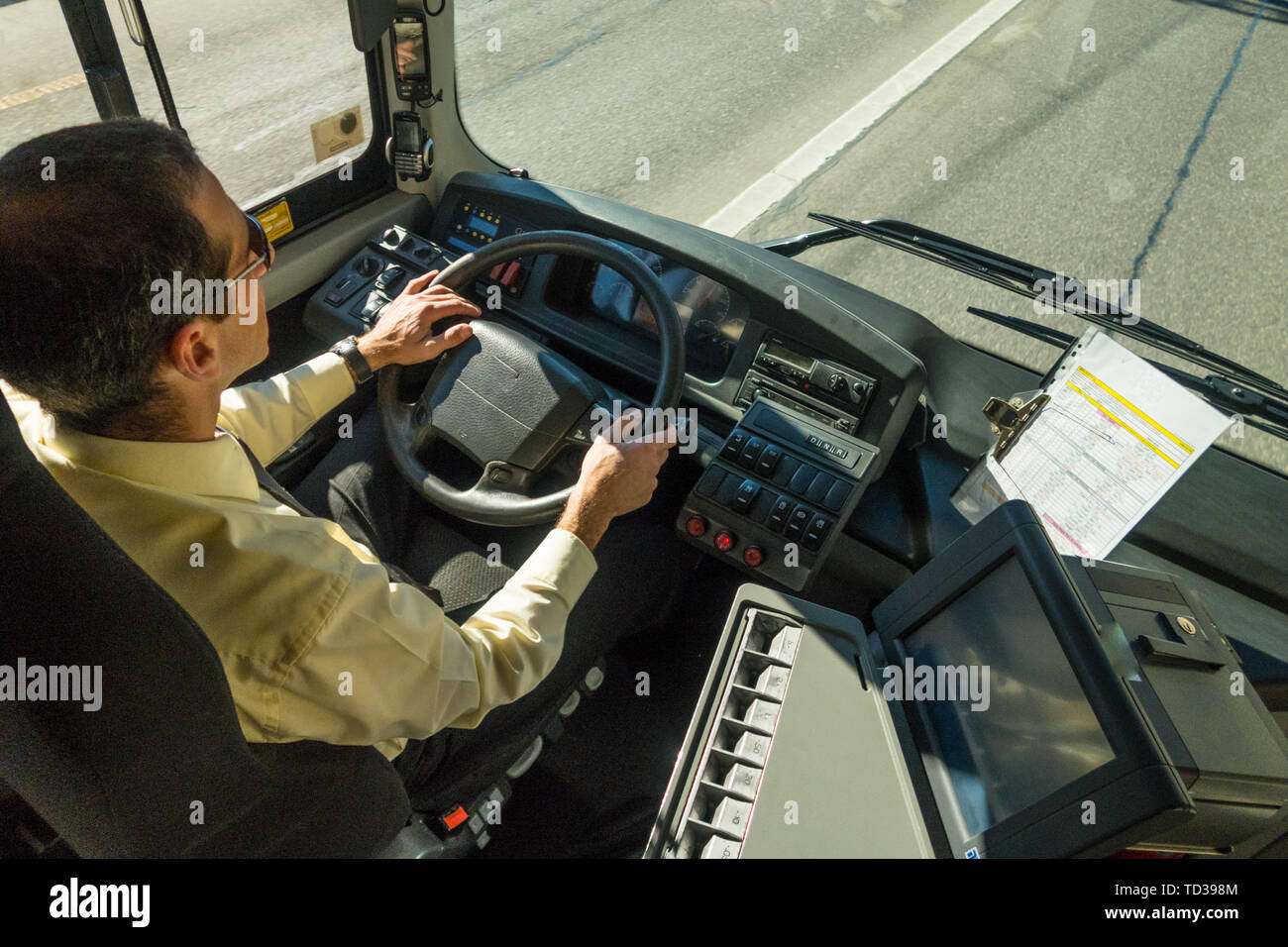 Photos d'un chauffeur d'autobus travaillant Banque D'Images