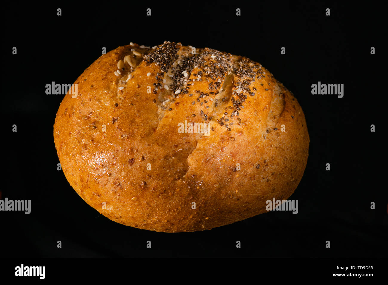 Pain de blé flottant dans le vide noir Banque D'Images