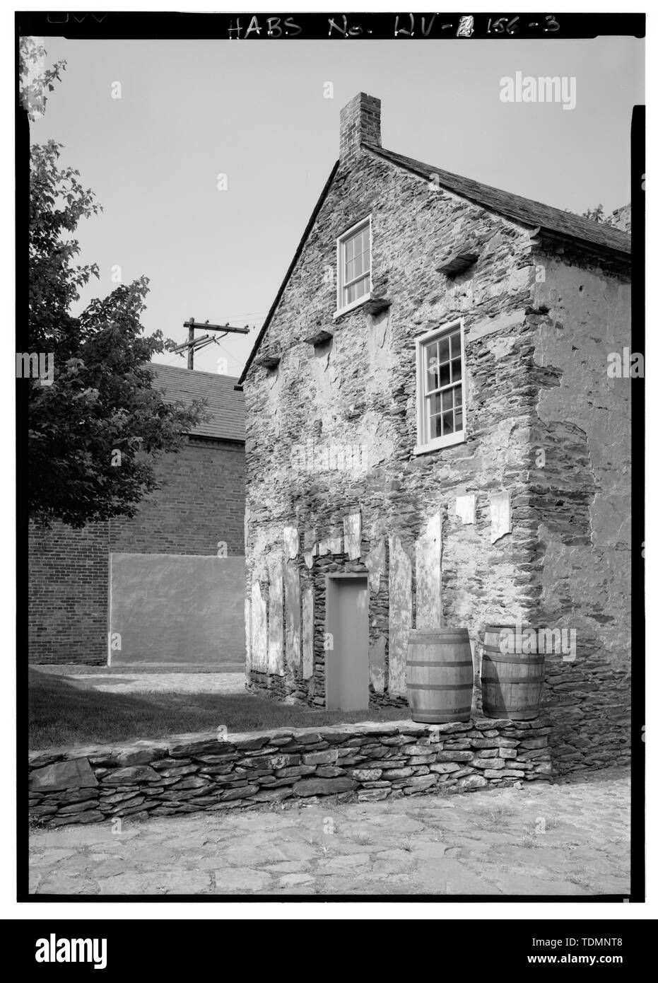 Détail de l'angle sud-ouest (arrière) du mur sud pour montrer la projeter des pierres sur la ligne de l'avant-toit. - White Hall, Potomac Street, Harpers Ferry, Comté de Jefferson, WV, Anderson, William ; Lindstrom, F J, émetteur Banque D'Images