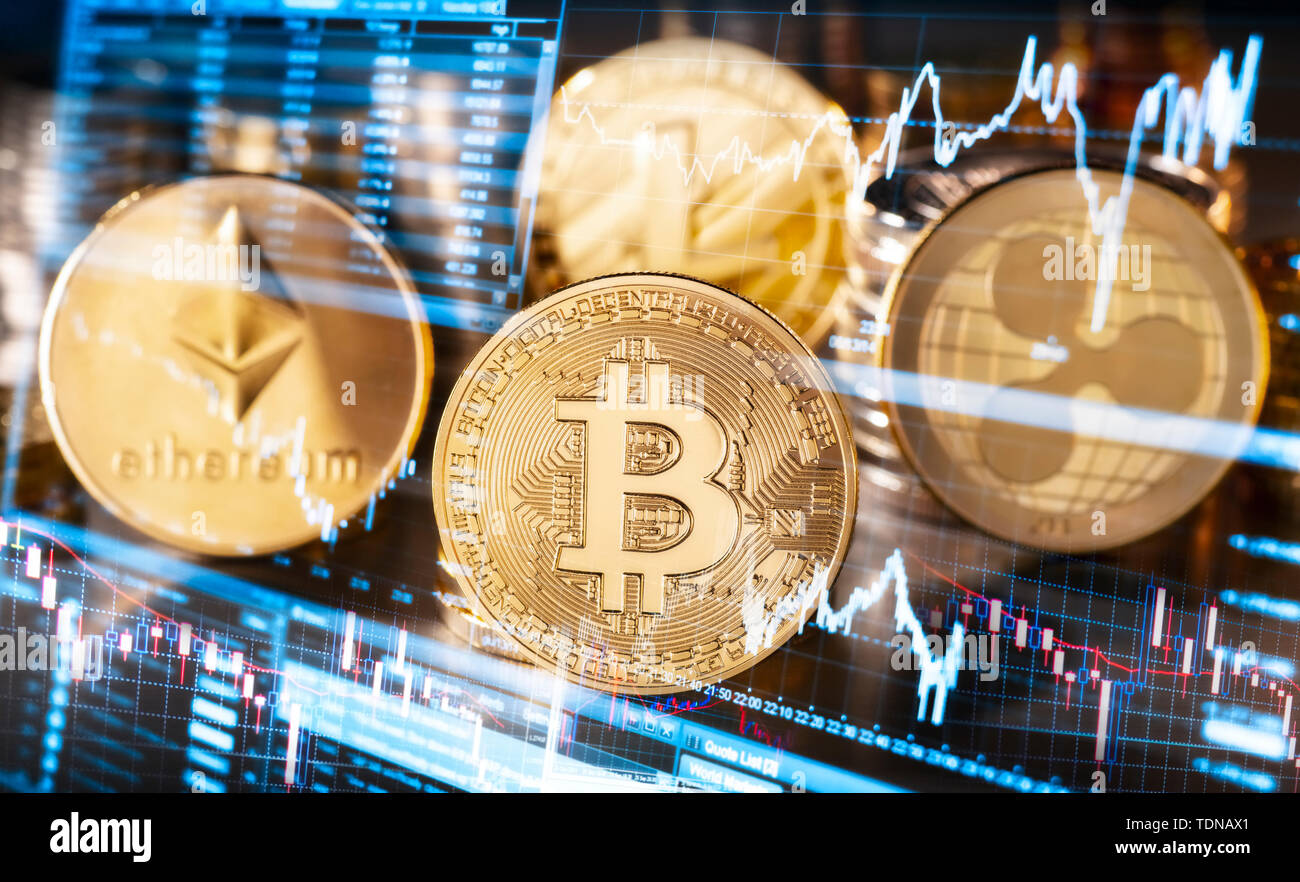 Coins des quatre plus hauts prix cryptocurrencies avec symboles de la fluctuation des taux de change Banque D'Images