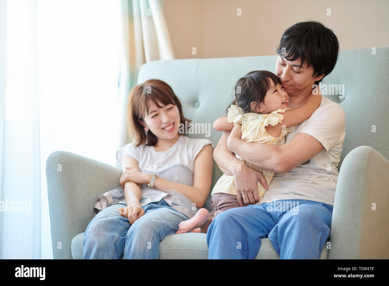 Famille japonaise à la maison Banque D'Images