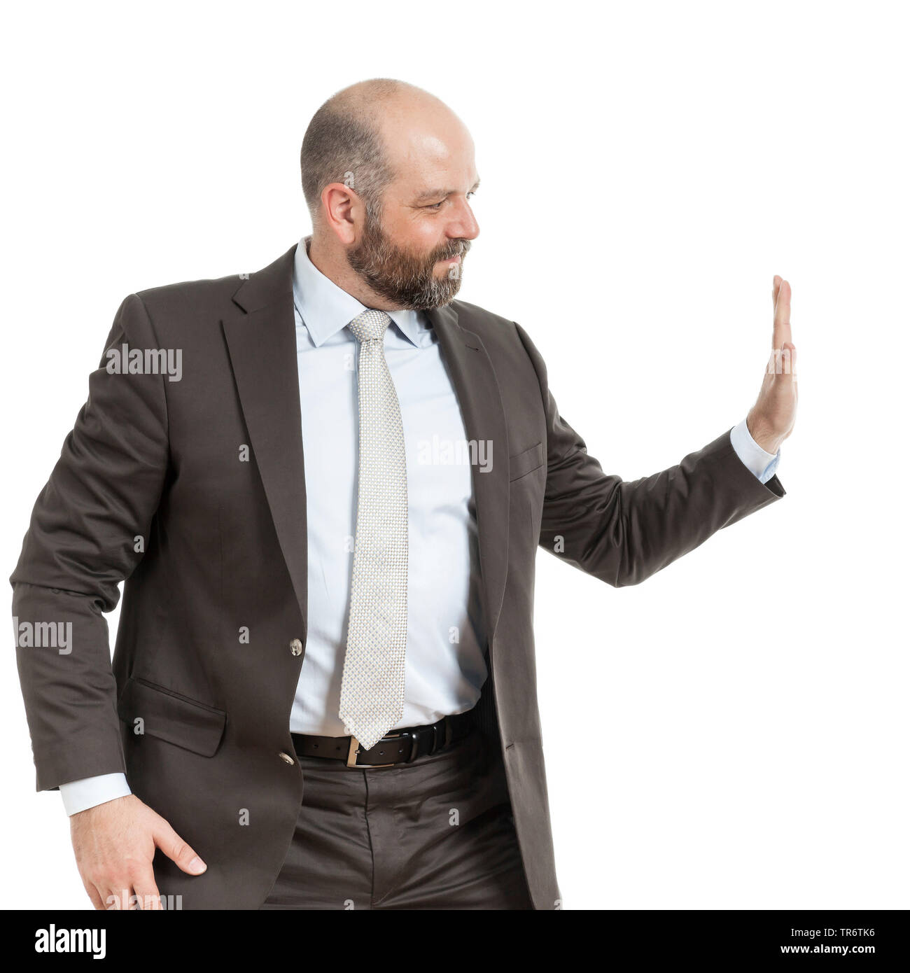 Décisions d'âge moyen businessmann geste défensif, portrait, Allemagne Banque D'Images