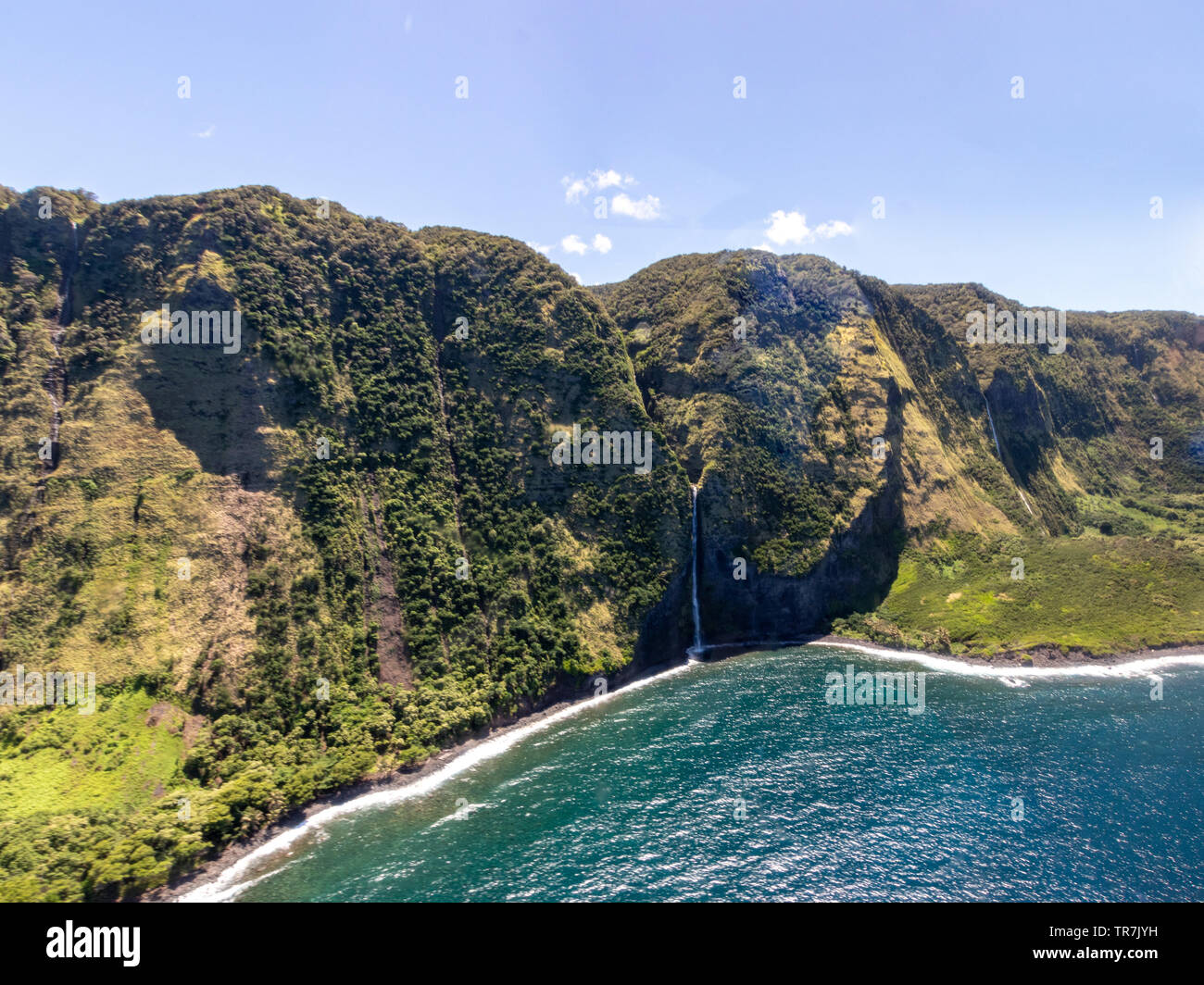 Cascades grace les flancs tout le long de la côte de Kona Banque D'Images