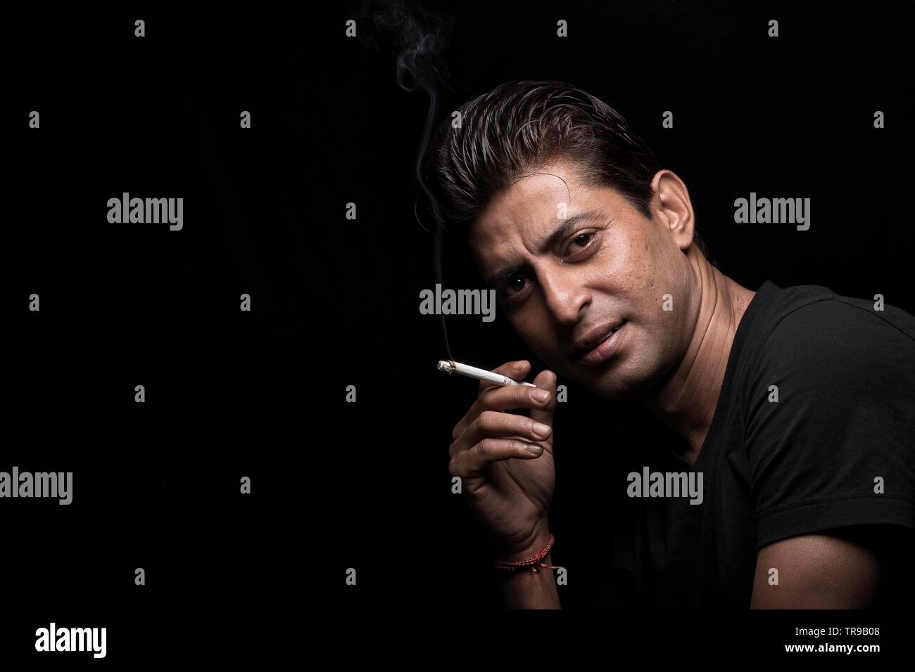L'homme avec le cigare Banque D'Images