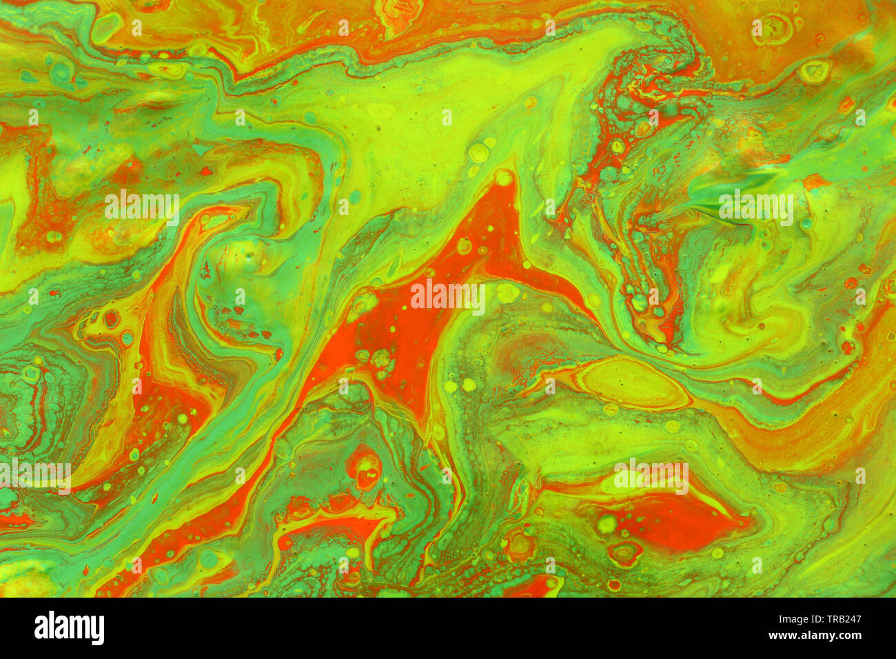 Photographie d'abstract background. effet marbré vert et orange couleurs créatives Banque D'Images