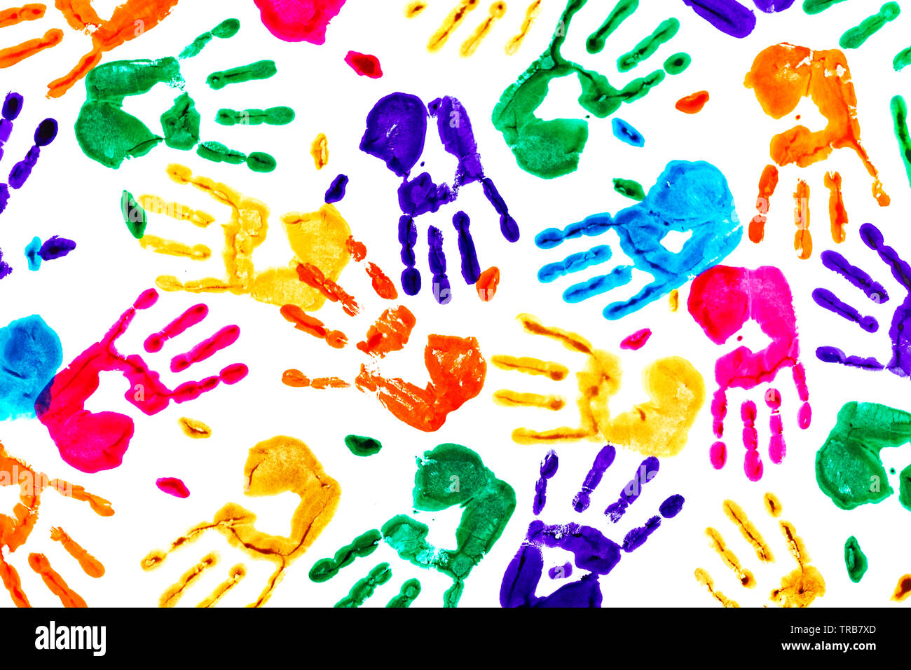 Résumé fond en empreintes de mains. Fond multicolore pour la conception. Isolé sur blanc. Banque D'Images