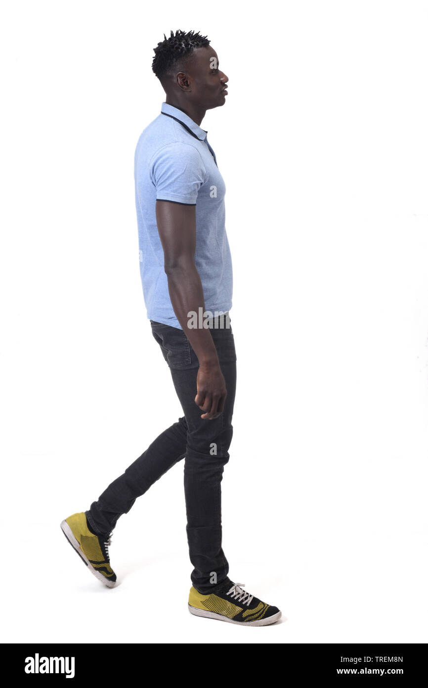 African man walking on white background Banque D'Images