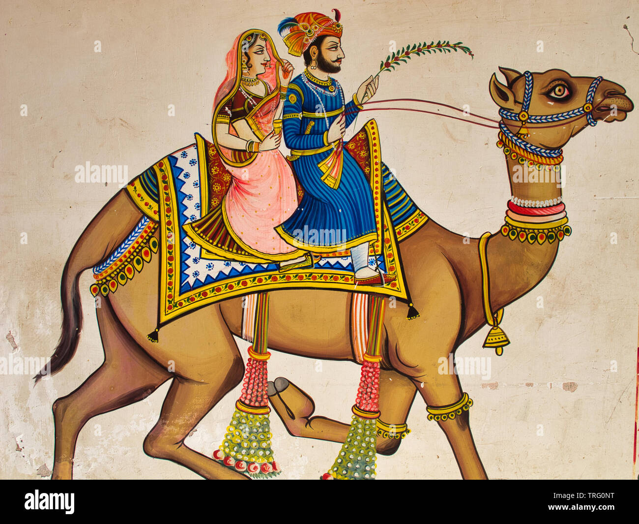 Peinture murale à Udaipur, Rajasthan, Inde, représentant un couple à cheval sur un chameau Banque D'Images