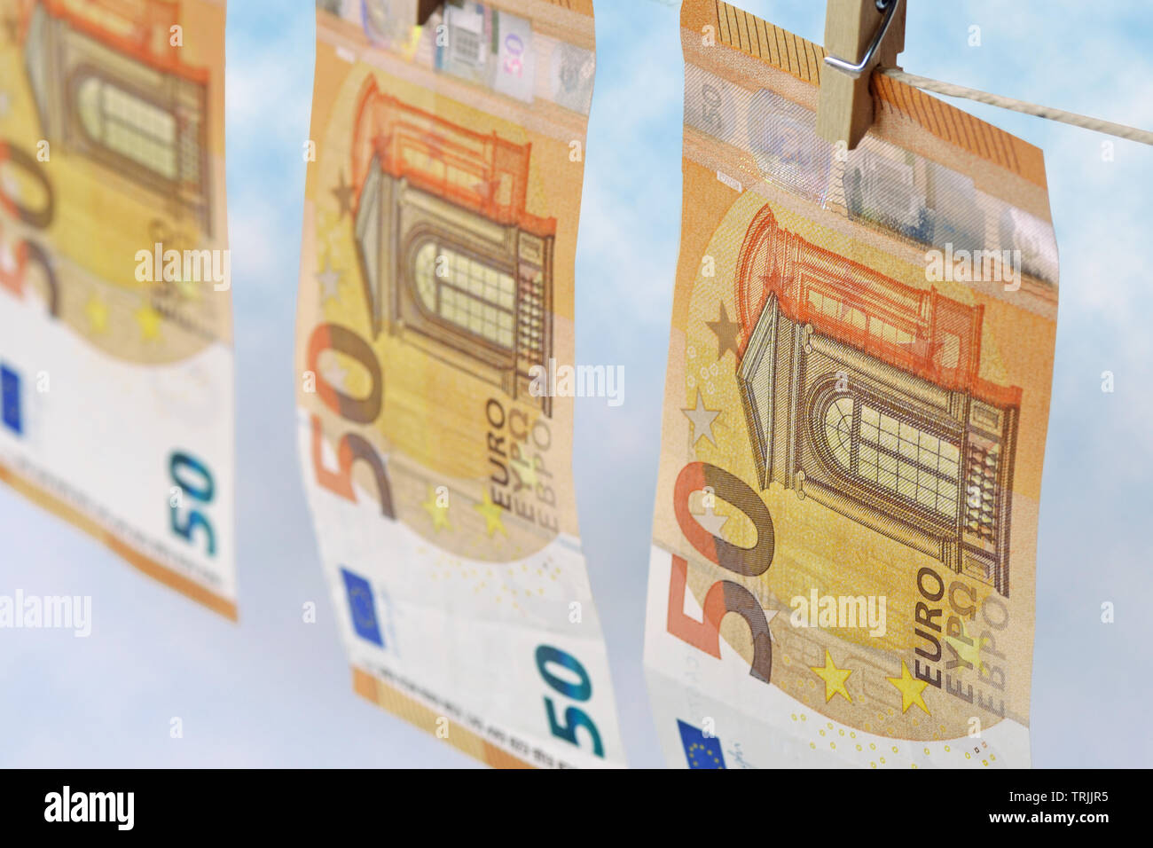Billets accroché sur une corde à linge Banque D'Images