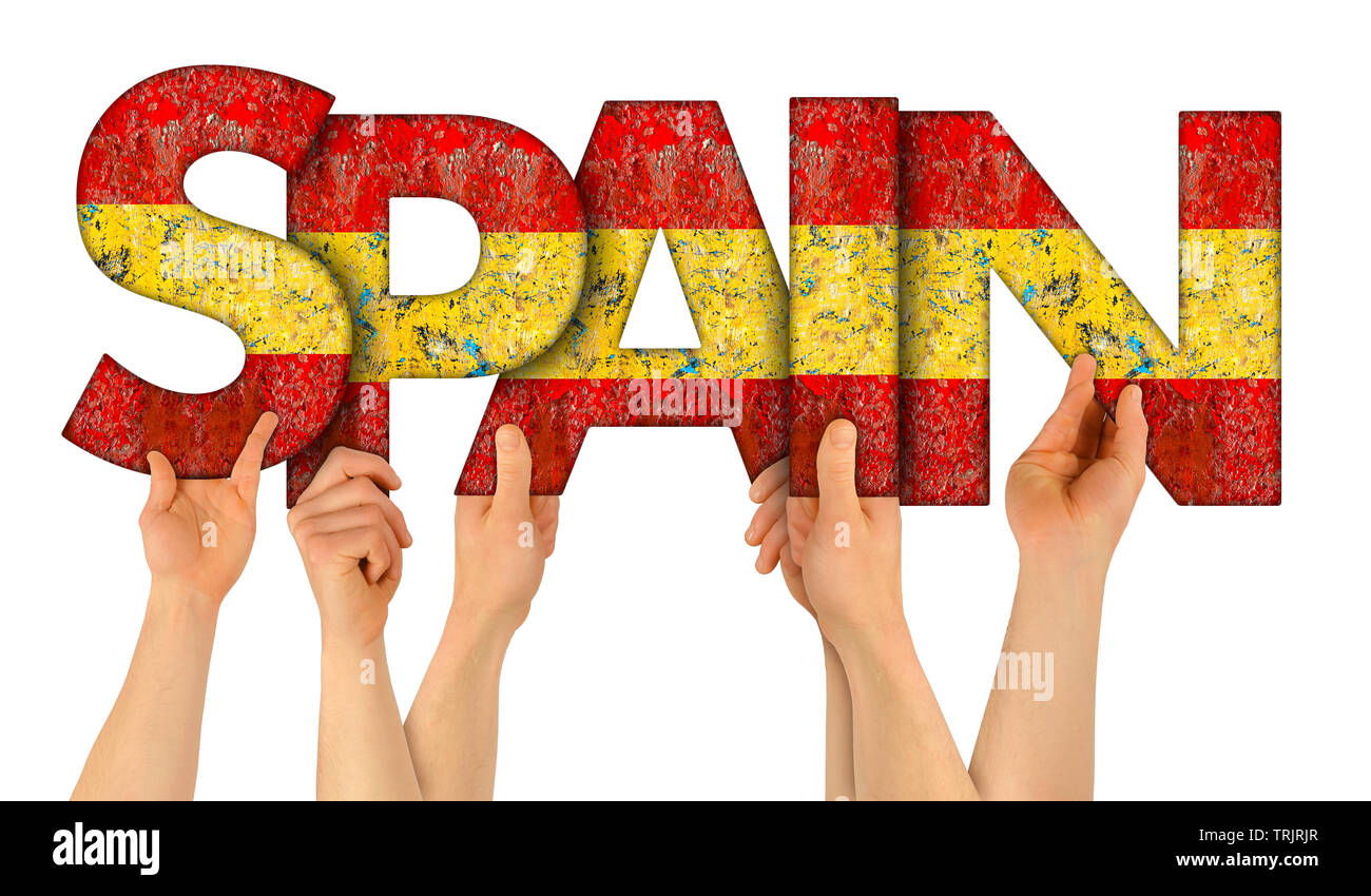 Les gens aux mains tenant en bois de lettrage lettre mot formant l'Espagne en espagnol les couleurs du drapeau national tourism travel nation concept isolé sur whit Banque D'Images