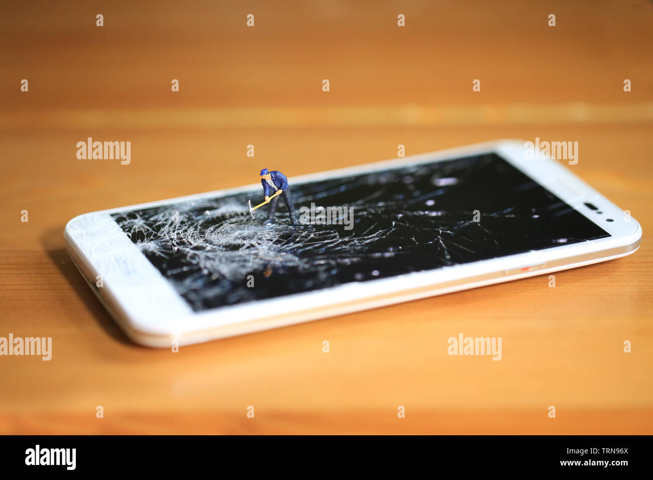 La technologie détruit le travailleur Banque D'Images