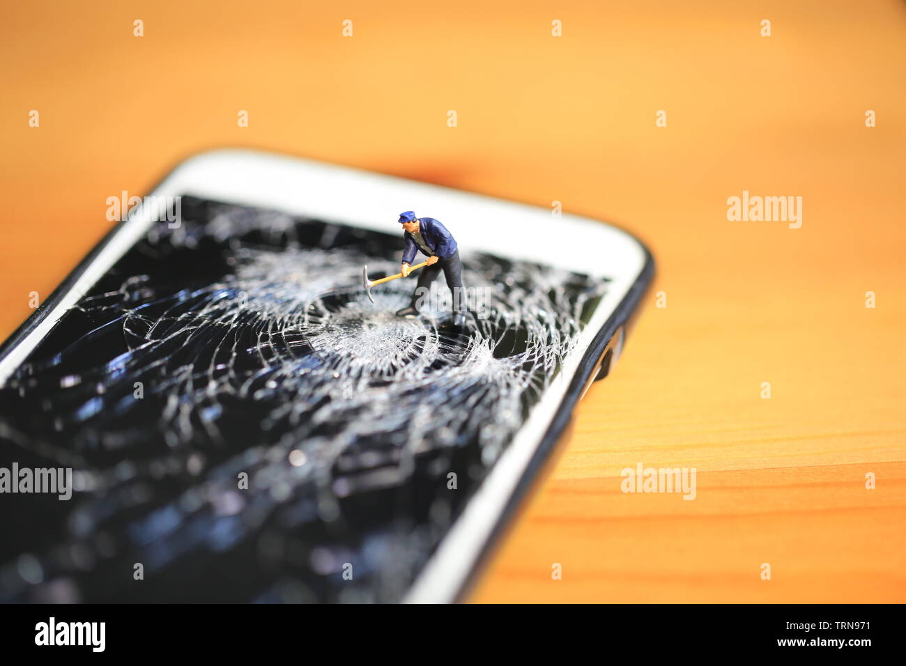 La technologie détruit le travailleur Banque D'Images