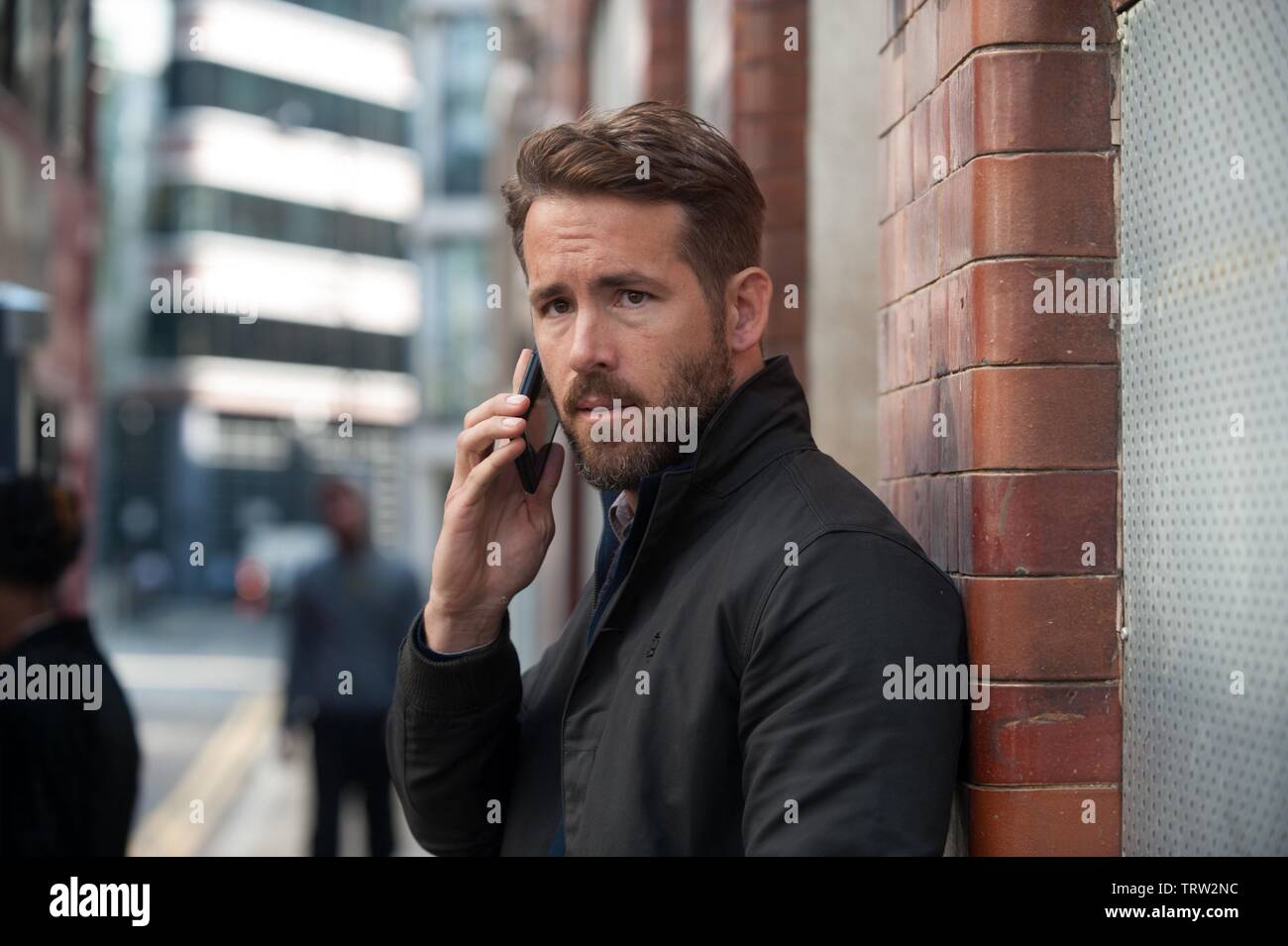 RYAN REYNOLDS EN MATIÈRE PÉNALE (2016). Copyright : Editorial uniquement. Pas de merchandising ou des couvertures de livres. C'est un document distribué au public. Les droits d'accès uniquement, aucune licence de droit d'auteur prévue. Seulement pour être reproduit dans le cadre de la promotion de ce film. Credit : BENDERSPINK/CAMPBELL GROBMAN FILMS/LIONSGATE/MALLENIUM FILMS / Album Banque D'Images