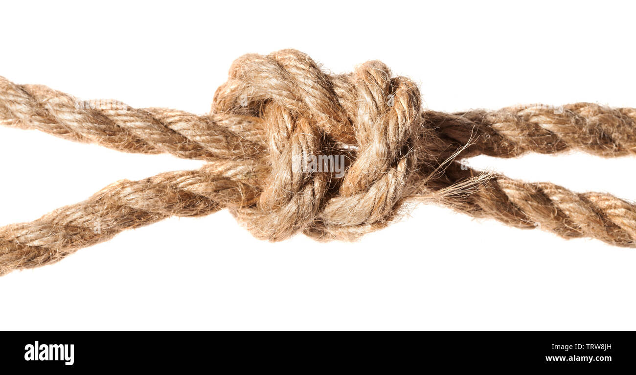 Braconnier's knot close up sur corde de jute épaisse isolé sur fond blanc Banque D'Images